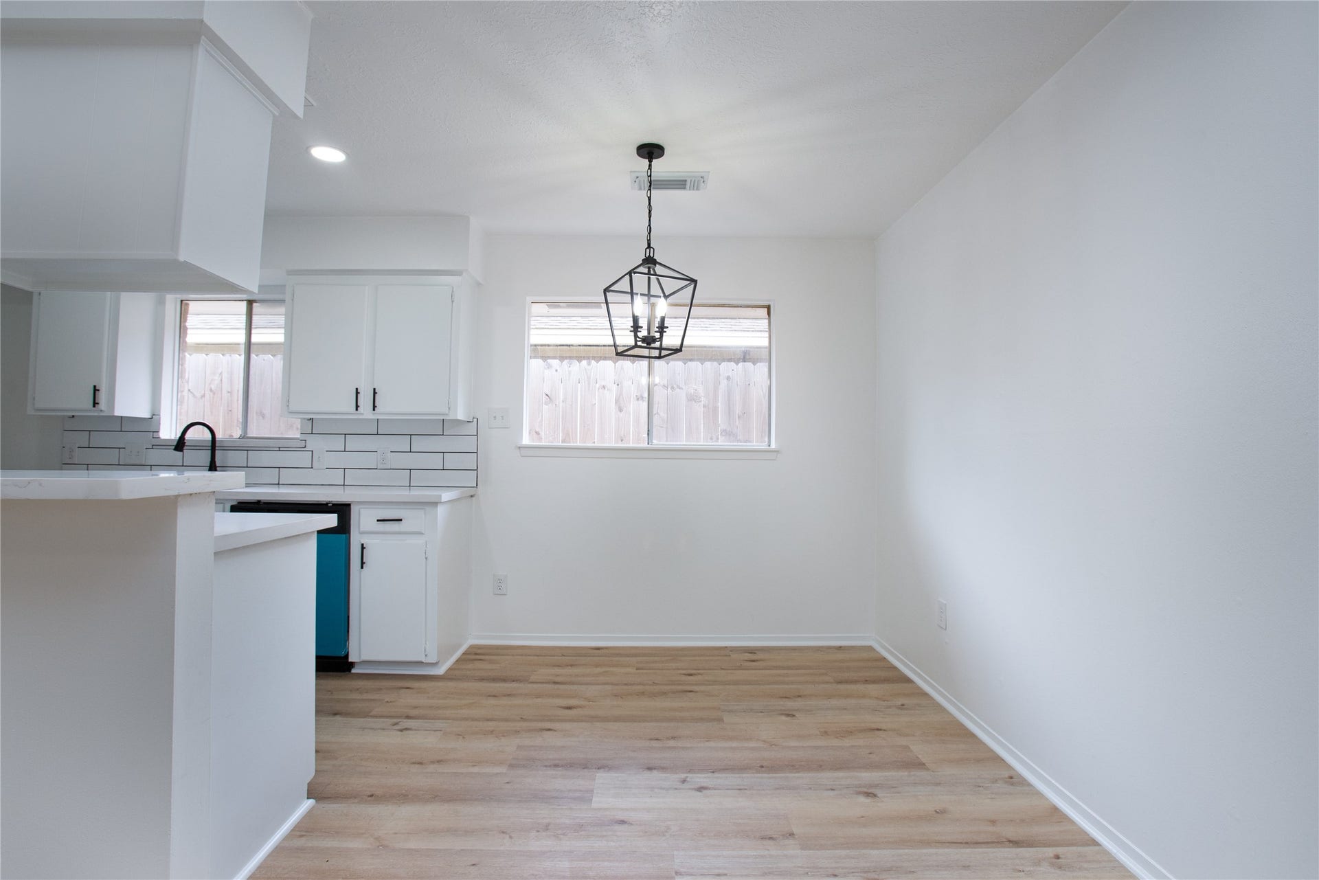 16131 Forest Way Drive, Houston, TX 77090 Breakfast room that brings in peaceful lighting.