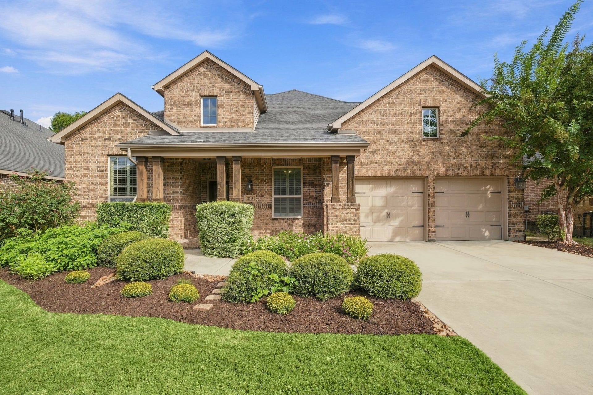 8319 Floating Heart Court, Conroe, TX 77385 A distinguished Highland Homes residence with timeless curb appeal.
