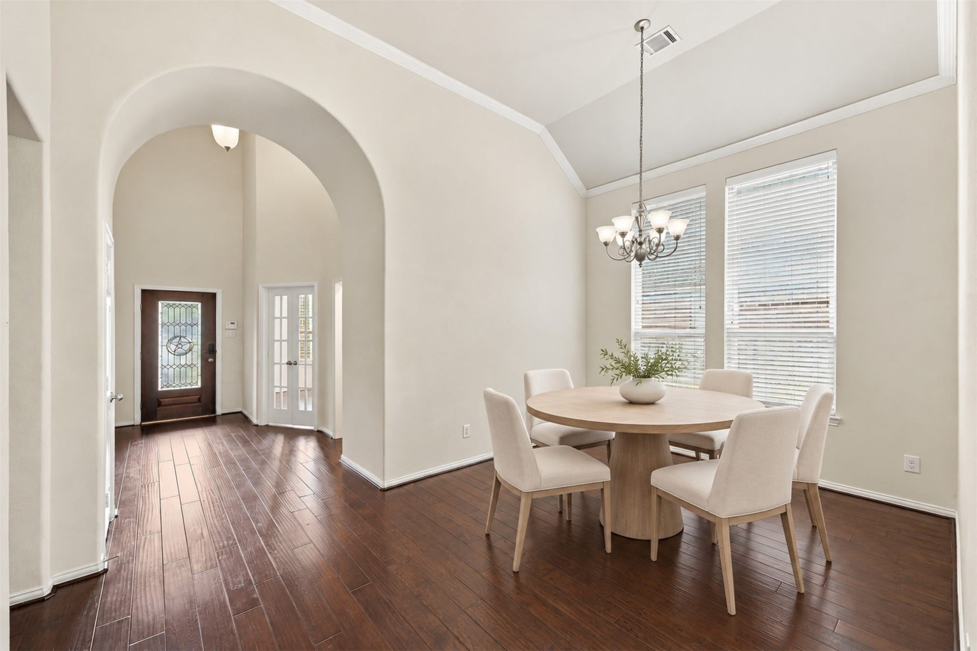 8319 Floating Heart Court, Conroe, TX 77385 Formal dining room with an elegant pass-through design connecting the entry and living room. *virtually staged*