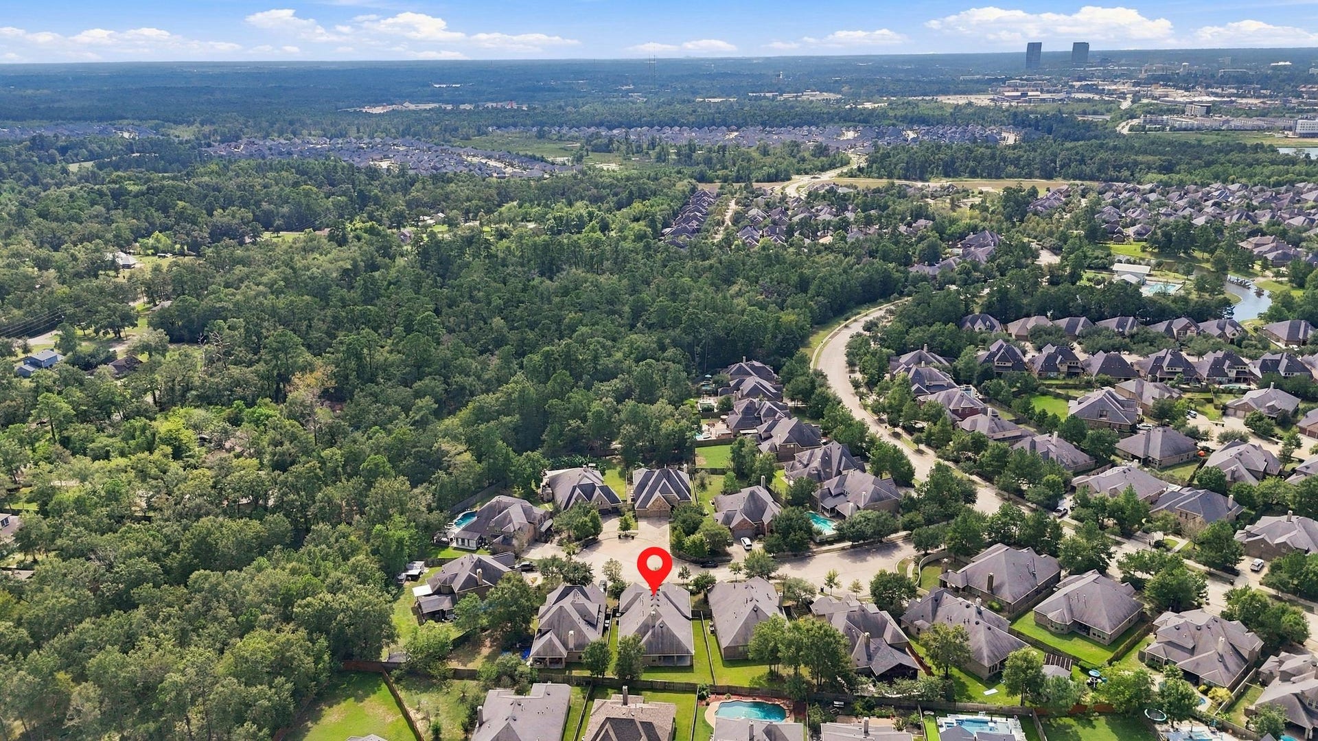 8319 Floating Heart Court, Conroe, TX 77385 Aerial perspective showcasing the beautiful surroundings of Harpers Preserve.