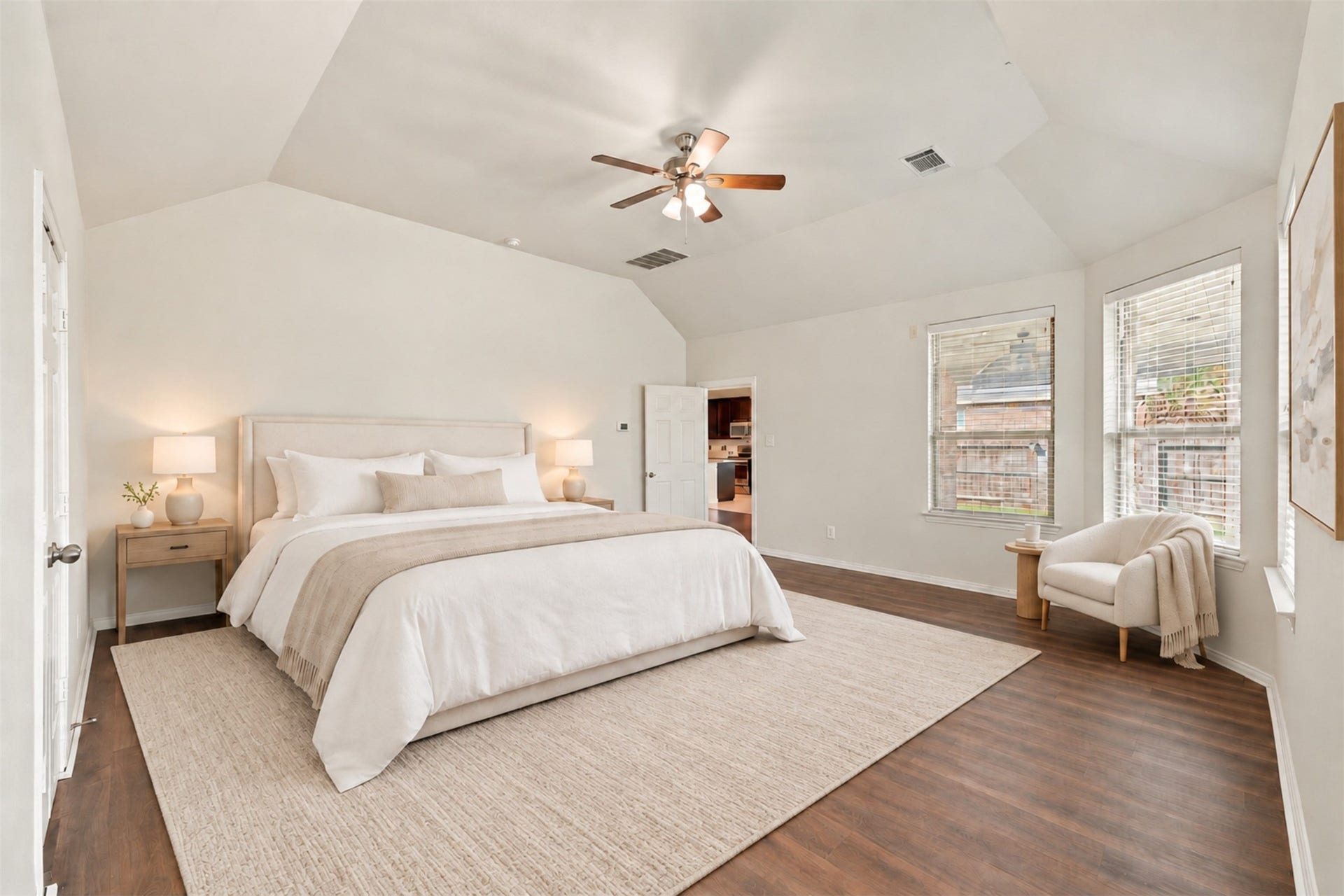 8319 Floating Heart Court, Conroe, TX 77385 Serene primary retreat with vaulted ceilings, warm natural light & space to unwind. *Virtually staged*