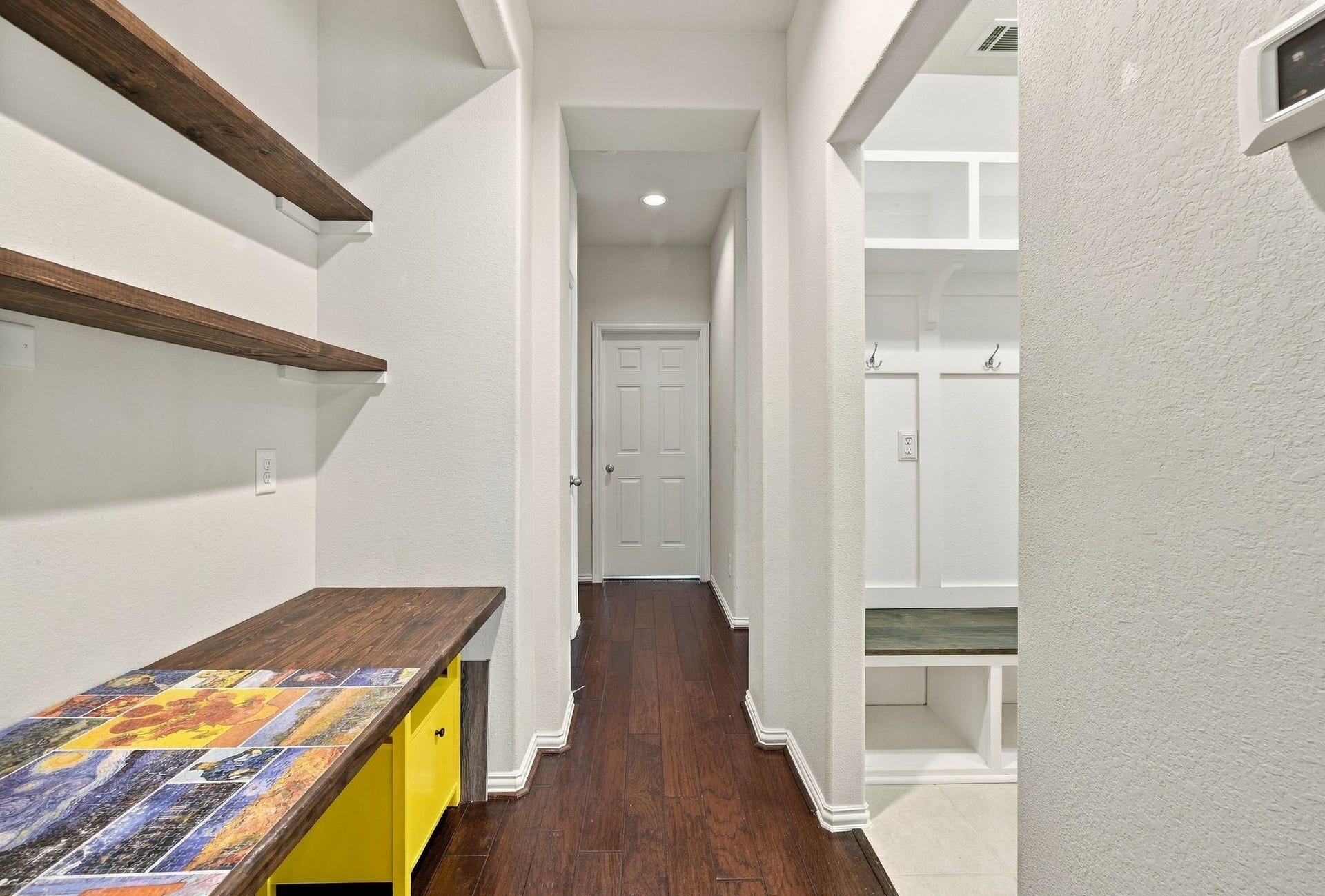 8319 Floating Heart Court, Conroe, TX 77385 Versatile secondary workspace conveniently positioned between the living area, bedrooms, laundry room & garage.