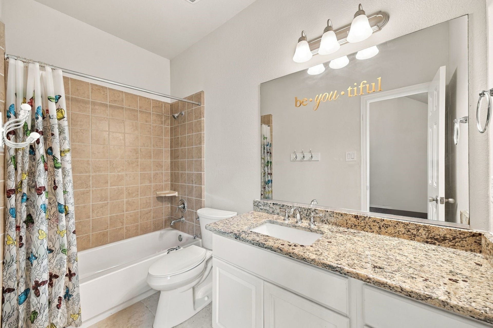 8319 Floating Heart Court, Conroe, TX 77385 Secondary bedroom 2 ensuite
