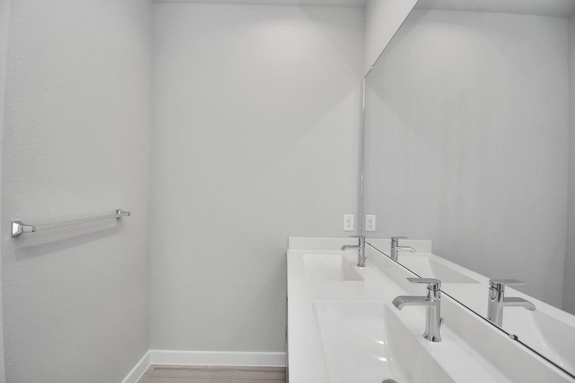 11027 Gardenia Creek Drive, Houston, TX 77044 Escape to a spa-like oasis in this primary bathroom. Enjoy a walk-in shower with tile surround, a separate garden tub with custom detailing, and an elegant vanity featuring light countertops, modern hardware, and beautiful recessed lights. Experience luxury and relaxation in every detail. Sample photo of completed home with similar floor plan. Actual colors and selections may vary.