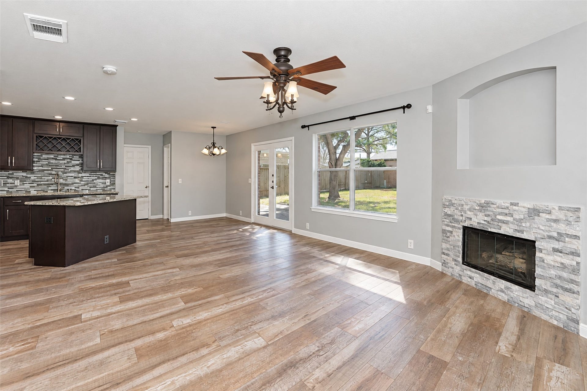 21203 Somerset Park Lane, Katy, TX 77450 Living room leading to kitchen and breakfast area