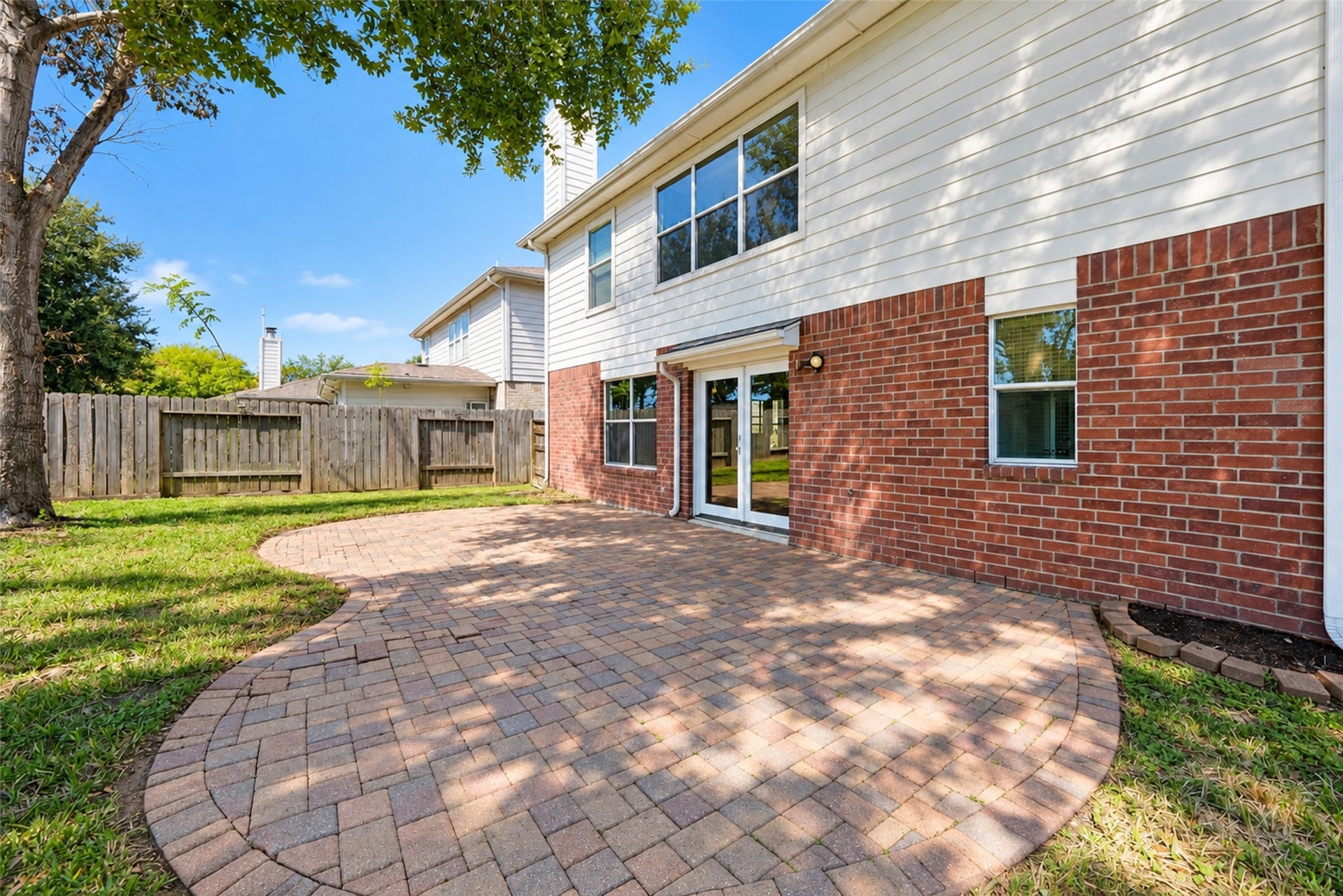 21203 Somerset Park Lane, Katy, TX 77450 Stone patio shaded by trees