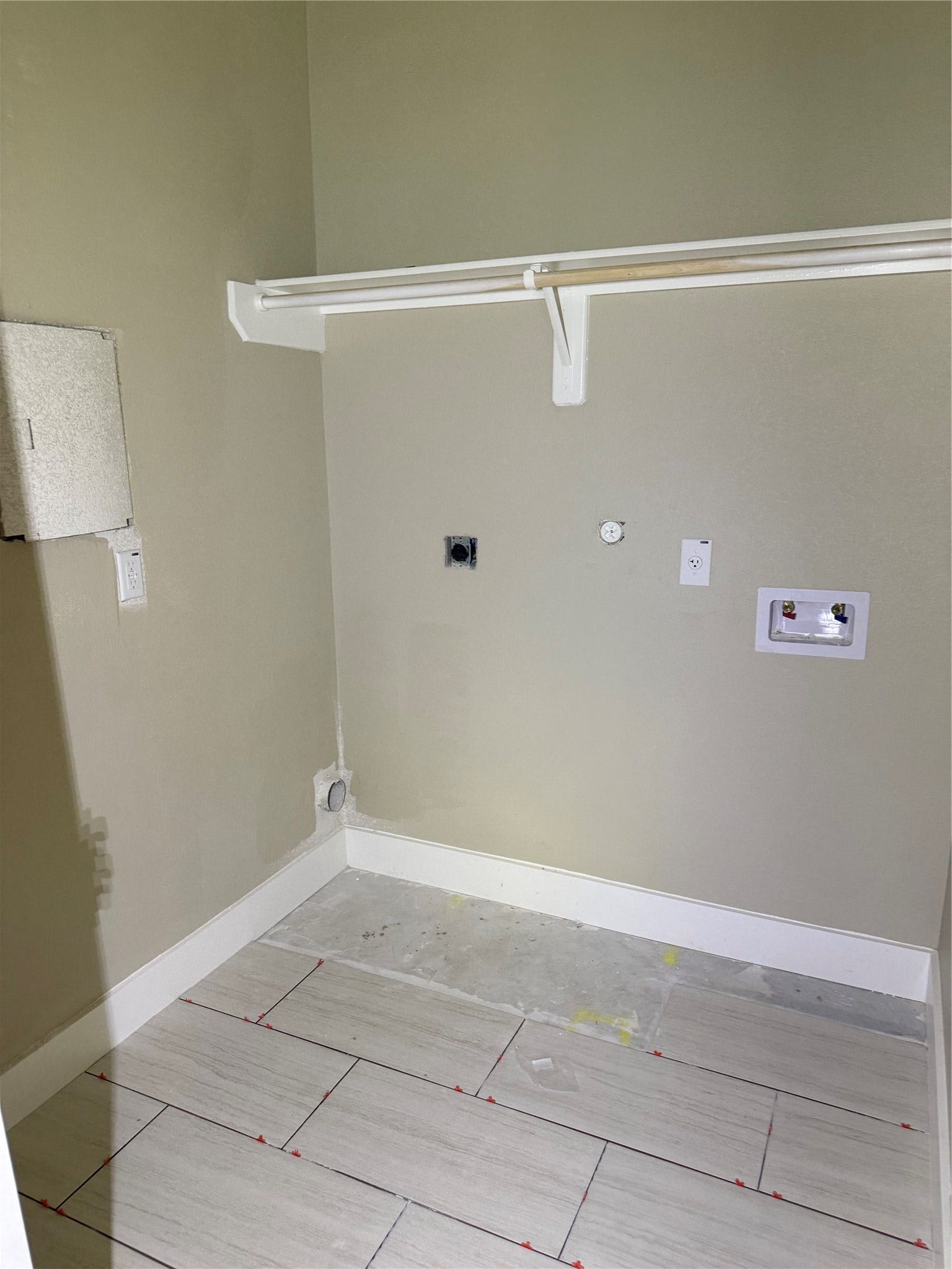 304 N N Ormsby Street, Alvin, TX 77511 indoor utility room with tile floors