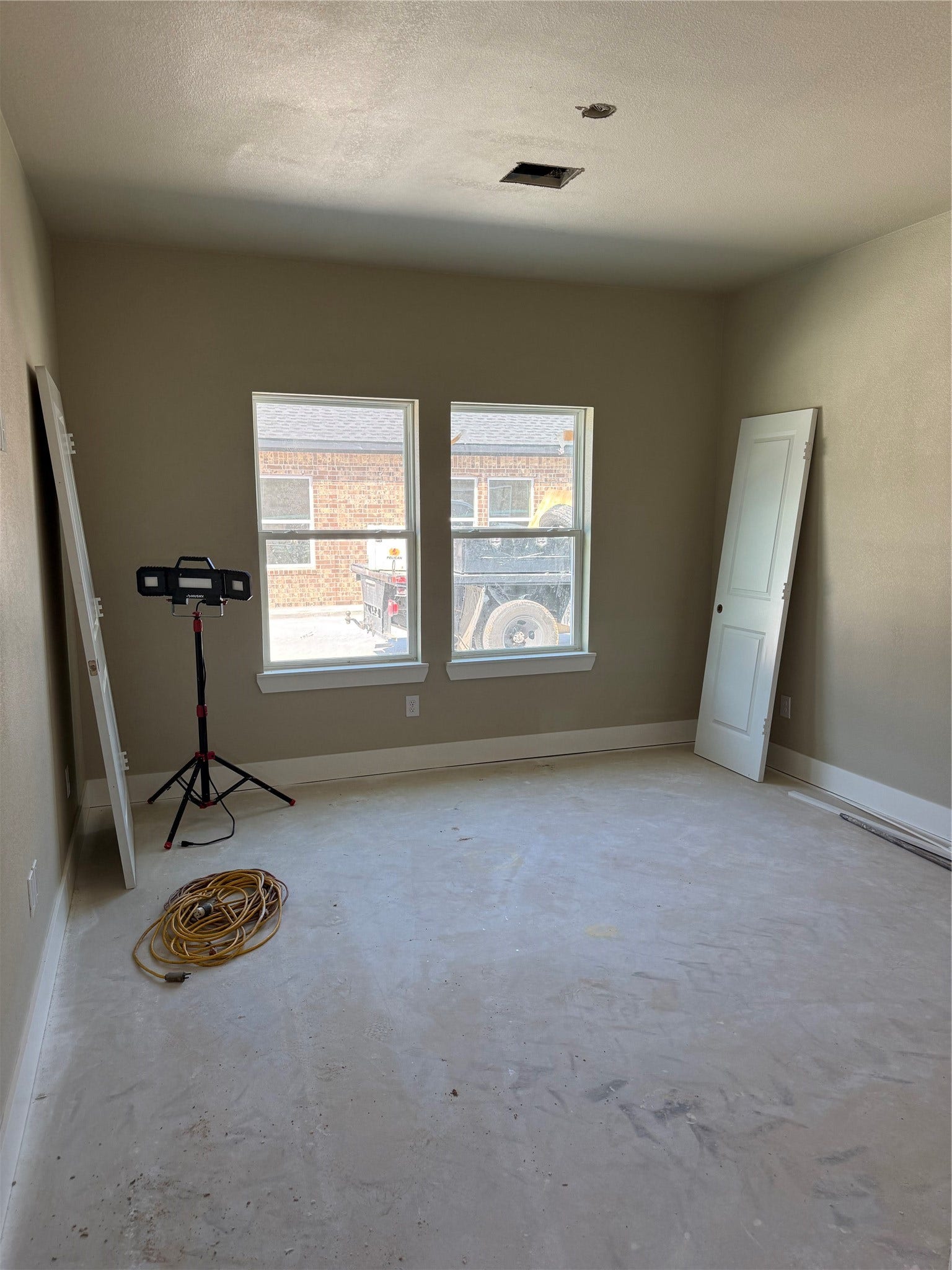 304 N N Ormsby Street, Alvin, TX 77511 Large Primary bedroom with 2 large windows