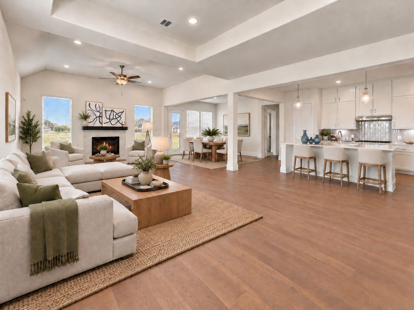 THE PERFECT SPACE TO GATHER & CONNECT! Imagine cozy evenings, lively conversations, and memorable get-togethers in this INVITING living space! The open floor plan brings the family room and kitchen together beautifully, while the spacious center island creates a natural gathering spot for family and friends. With GORGEOUS engineered wood flooring and a warm, welcoming atmosphere, this home is designed for making everyday moments feel special! **Photo is Virtually Staged**