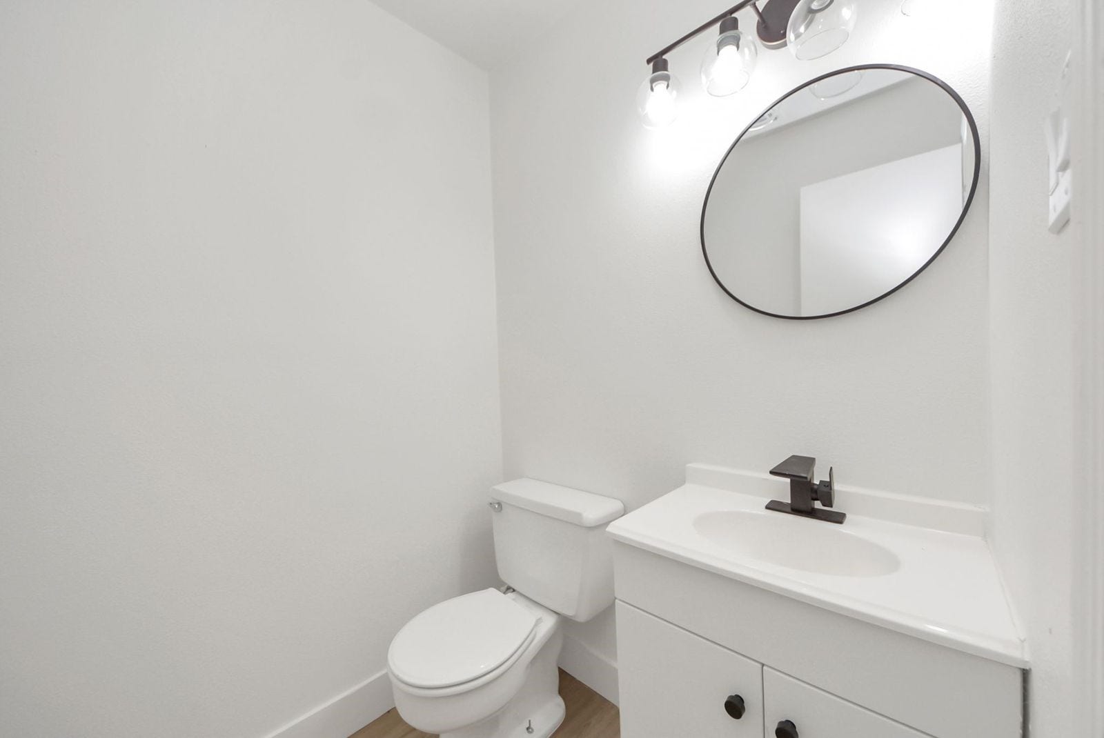 3013 Woodland Drive, Dickinson, TX 77539 Fully enclosed remodeled half bath located in the garage with a door for privacy.