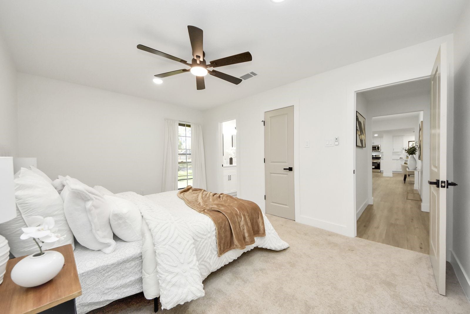 3013 Woodland Drive, Dickinson, TX 77539 Primary bedroom with view into living area.
