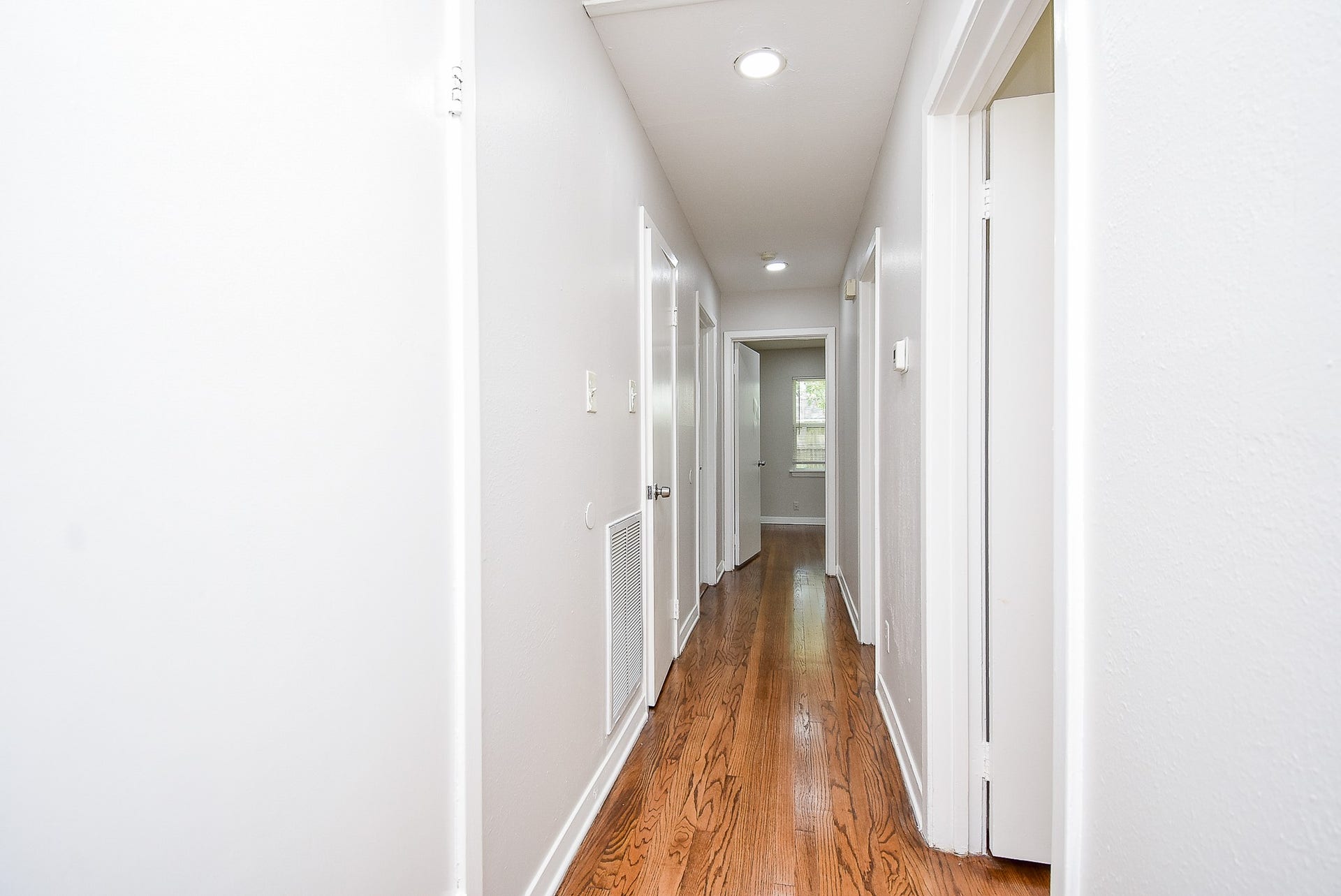 7406 Schiller Street, Houston, TX 77055 Hallway leads to all bedrooms.