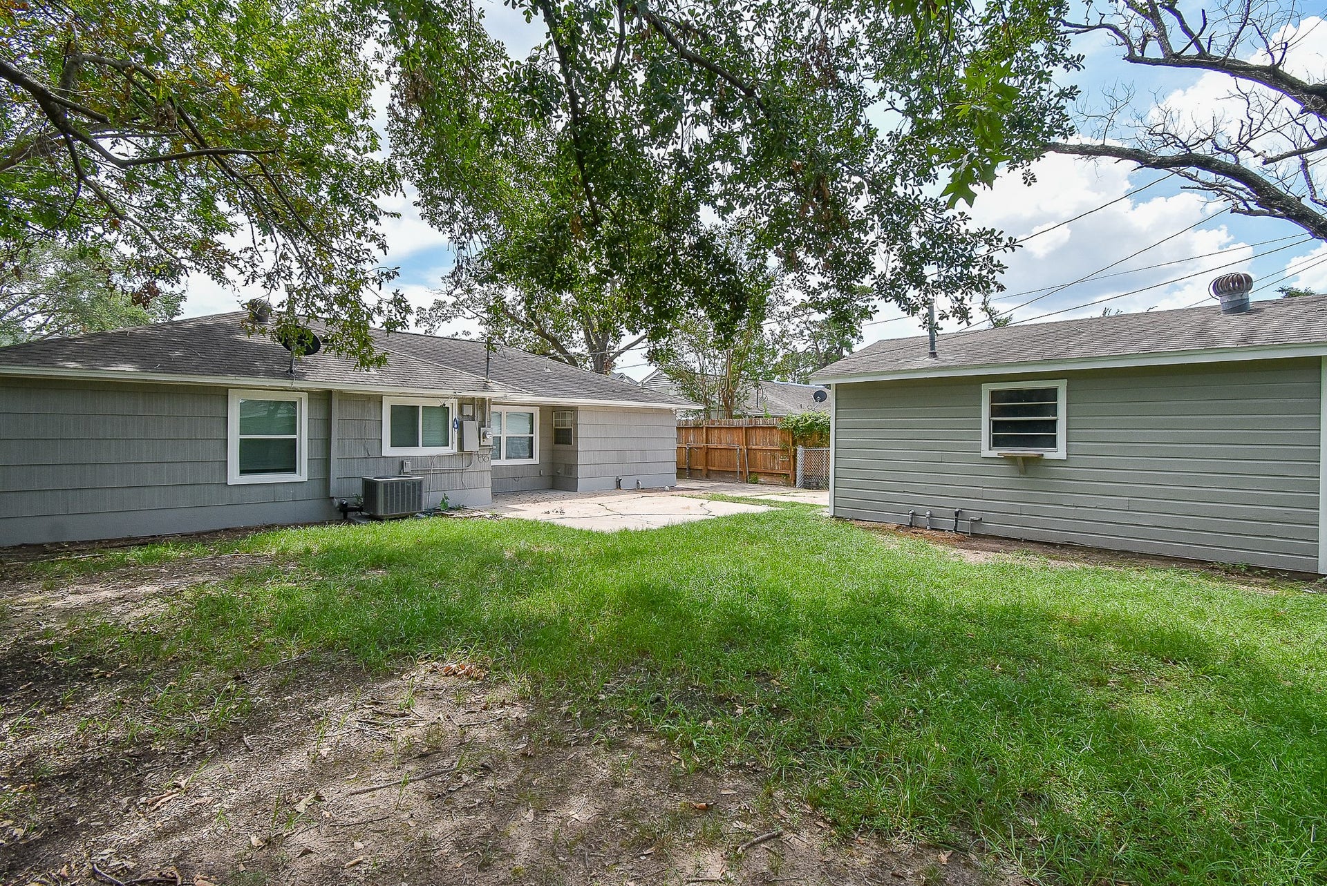 7406 Schiller Street, Houston, TX 77055 Home and detached garage.