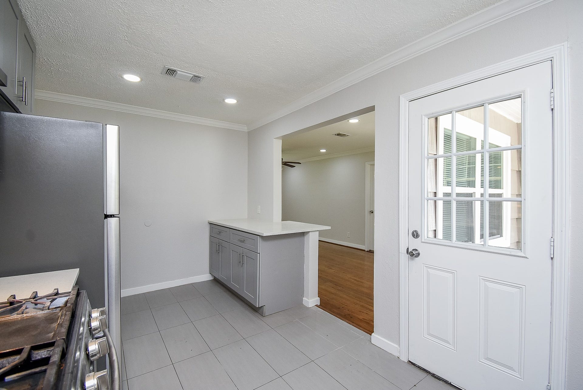 7406 Schiller Street, Houston, TX 77055 Convenient exterior door leads outside from the kitchen.