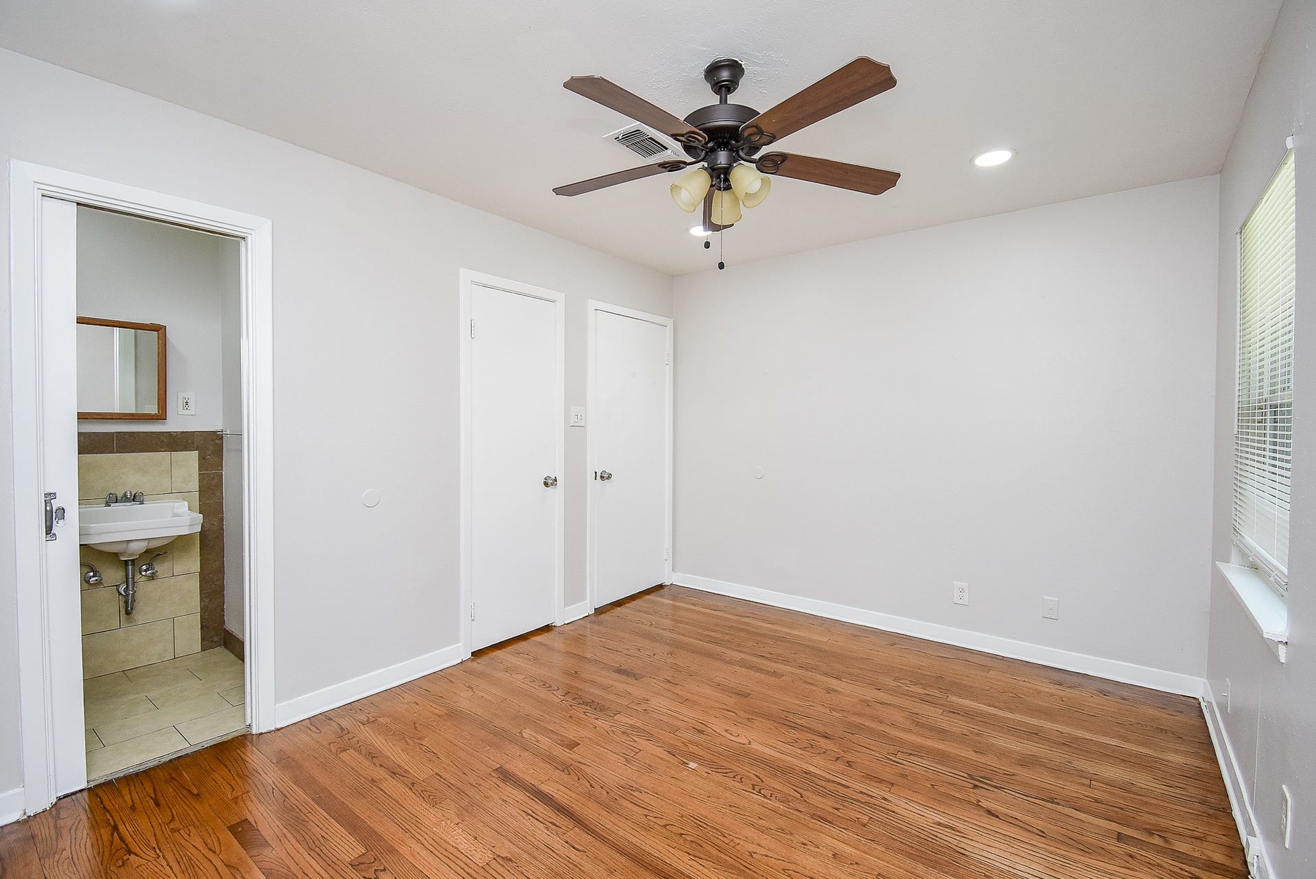 7406 Schiller Street, Houston, TX 77055 Bedroom three with half bathroom.