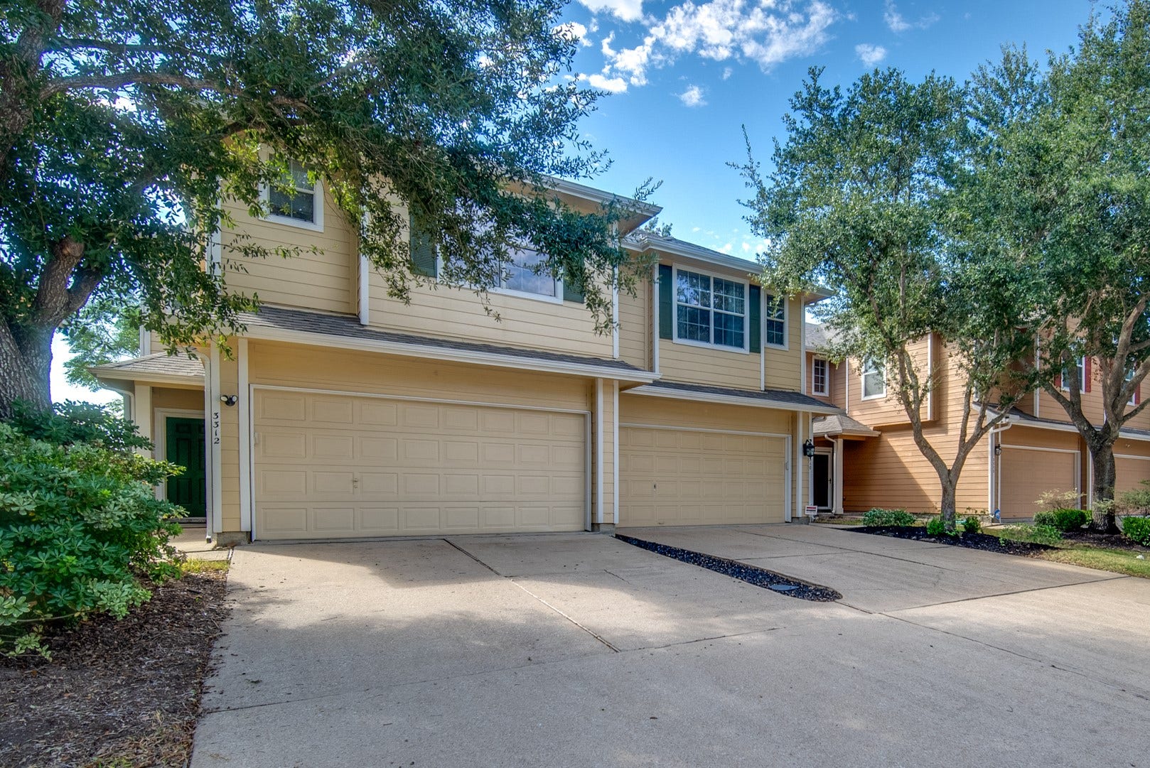 3310 Orchid Trace Lane, Houston, TX 77047 Townhome with garage and wide driveway