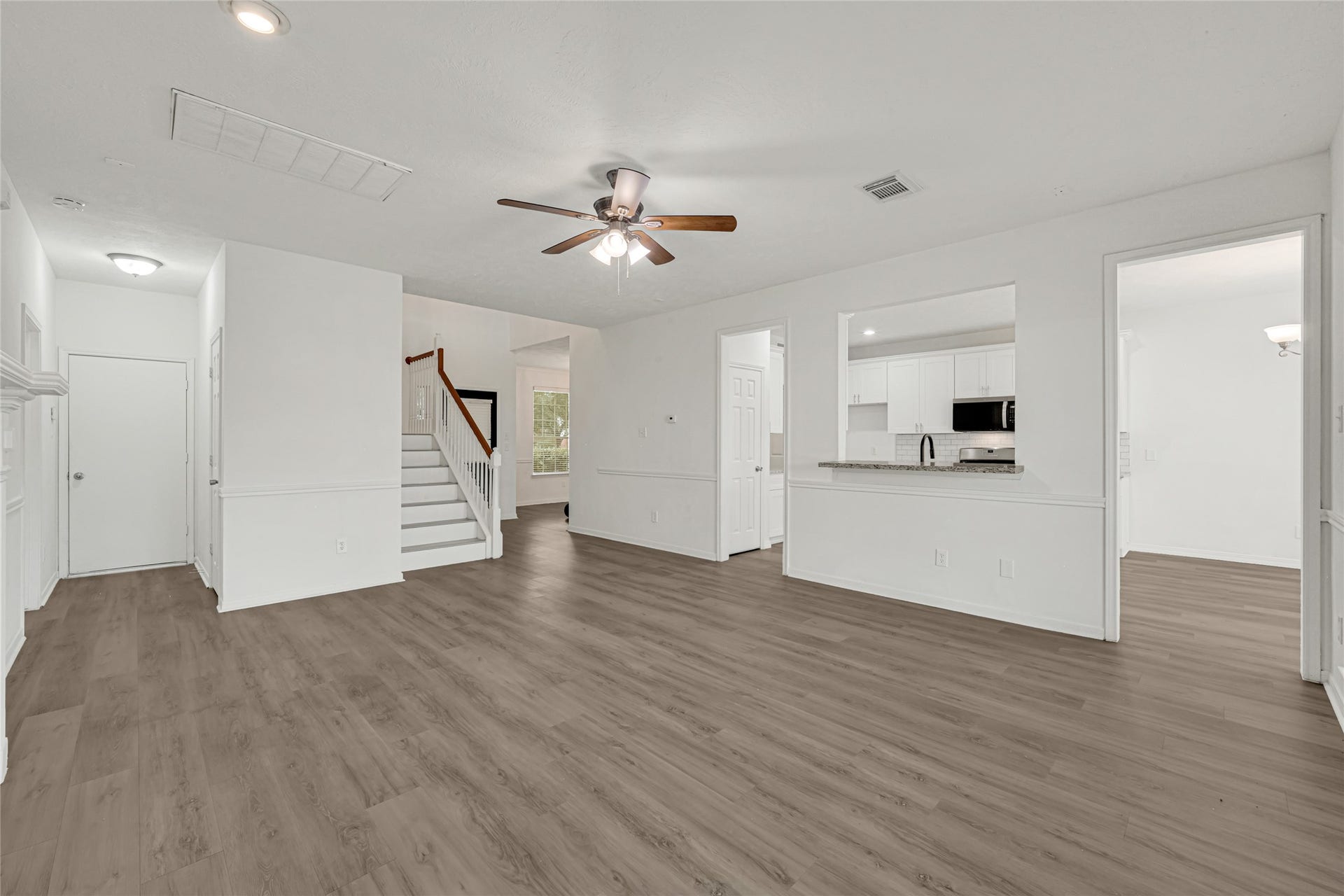 7314 Wooded Lake Lane, Richmond, TX 77407 Spacious Family Room with abundant natural light and an open, inviting layout.