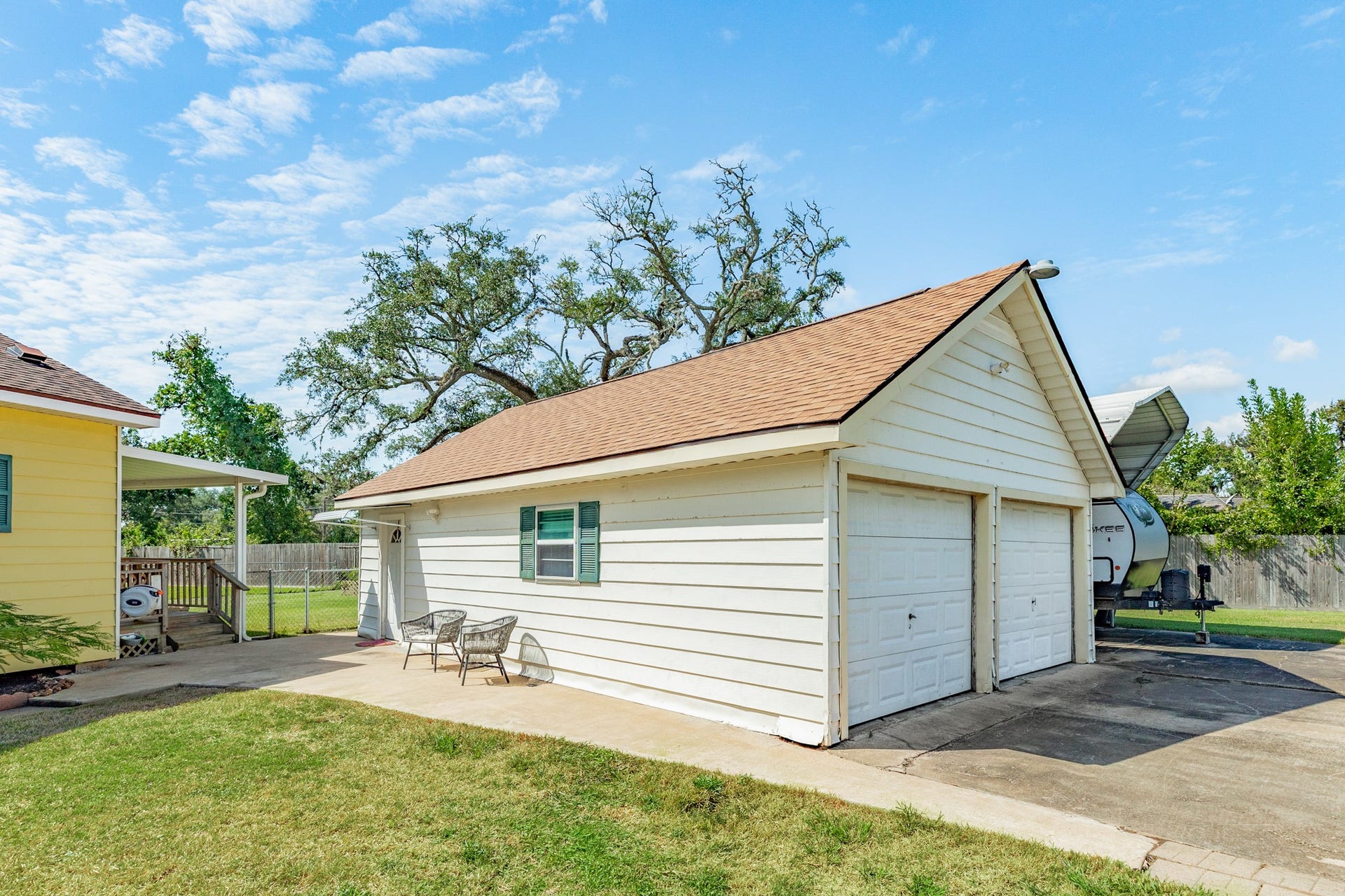Oversized Detached garage with a workshop.
