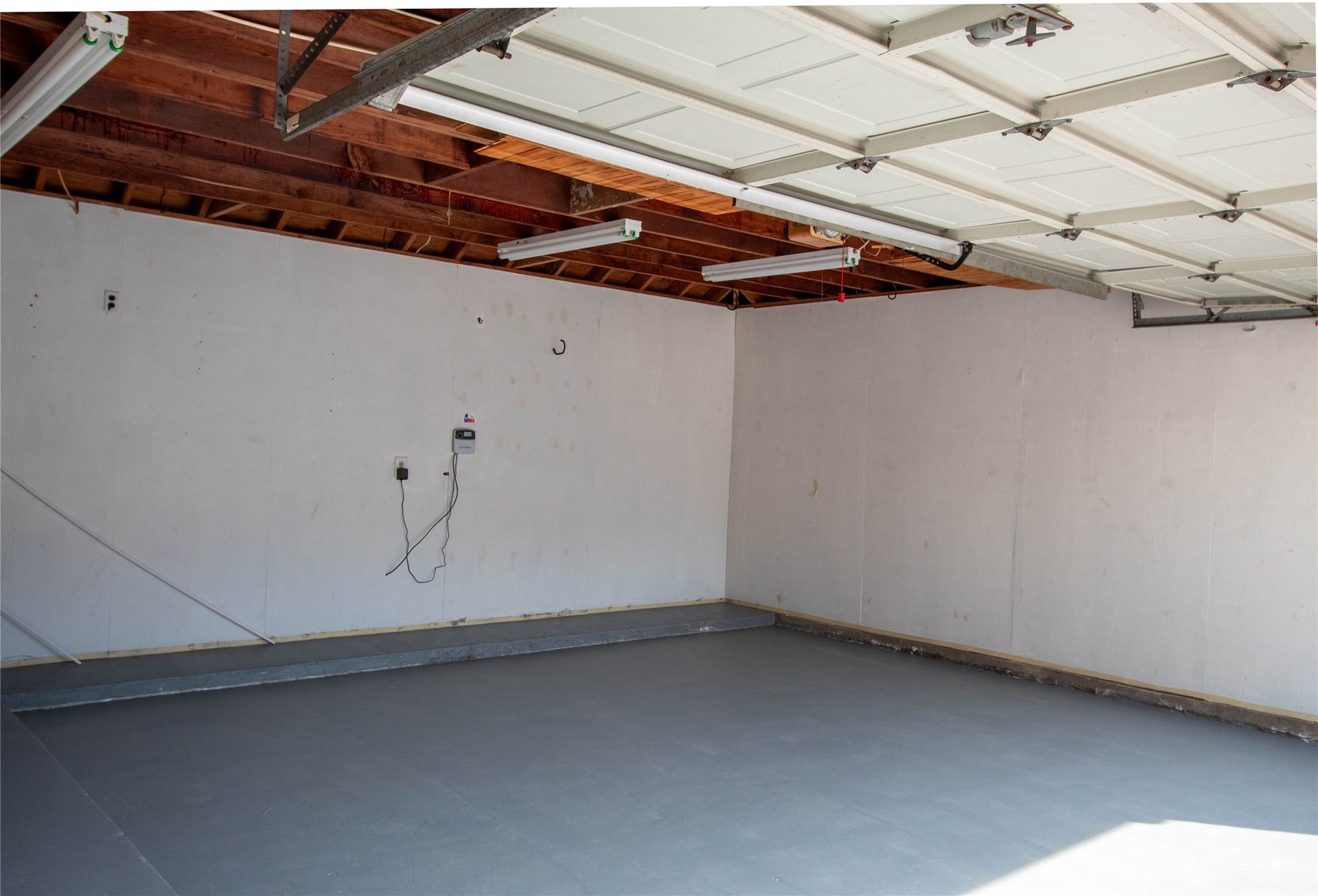 4700 Broadmoor Drive, League City, TX 77573 The sprinkler system control is in the garage and has an automatic setting.