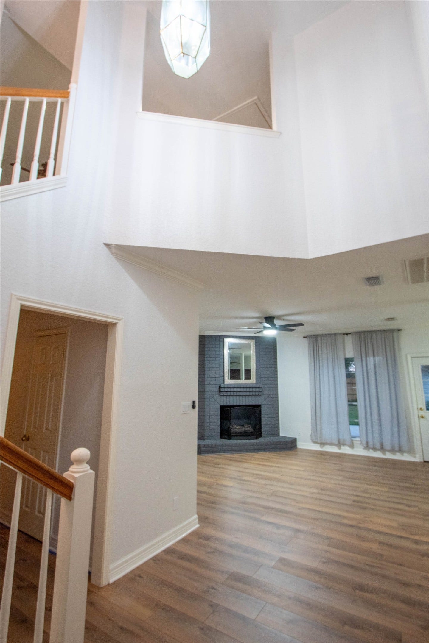4700 Broadmoor Drive, League City, TX 77573 Looking at the foyer and family room.