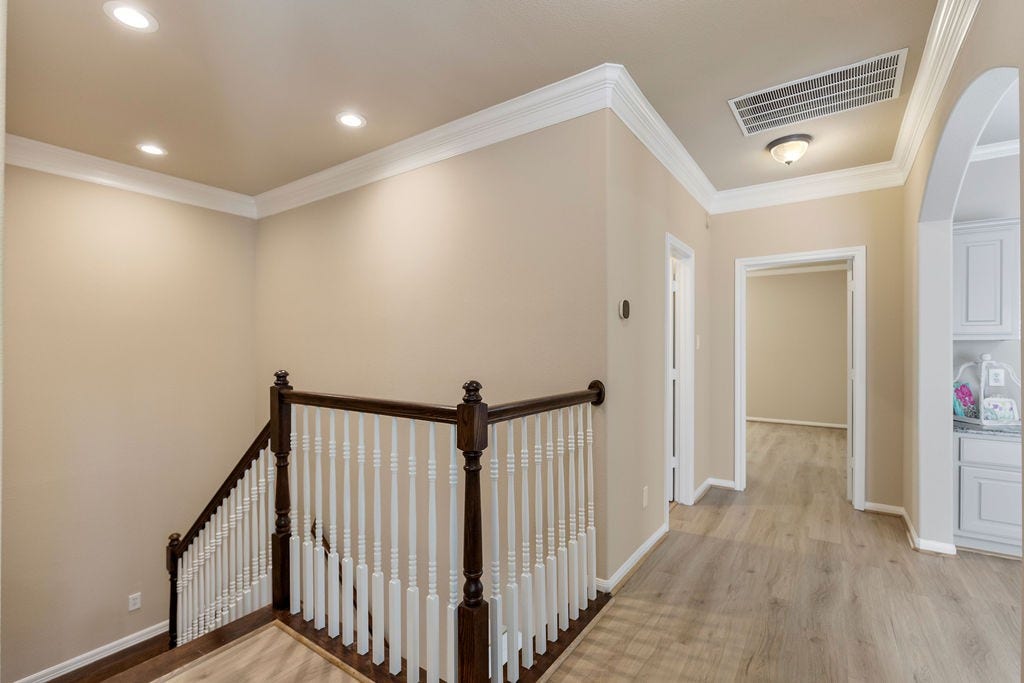 82 Mill Point Place, The Woodlands, TX 77380 The two additional guest bedrooms are towards the front of the home.