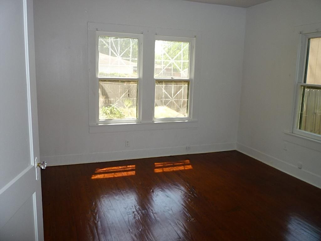 316 S Nugent Street, La Porte, TX 77571 Primary bedroom with view of the fully fenced back yard