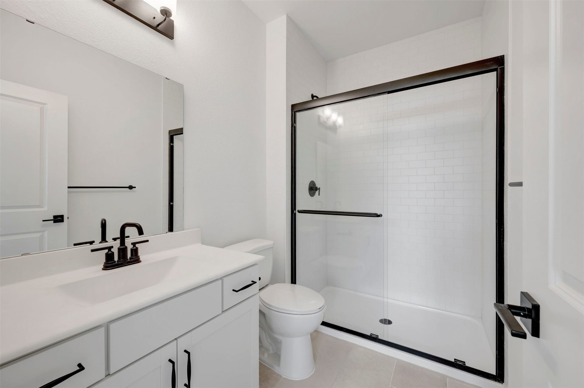 2124 River Maple Drive, Magnolia, TX 77363 Extra Suite bath (*Photo not of actual home and used for illustration purposes only. Colors/finishes may differ from the ones currently selected in the home.)