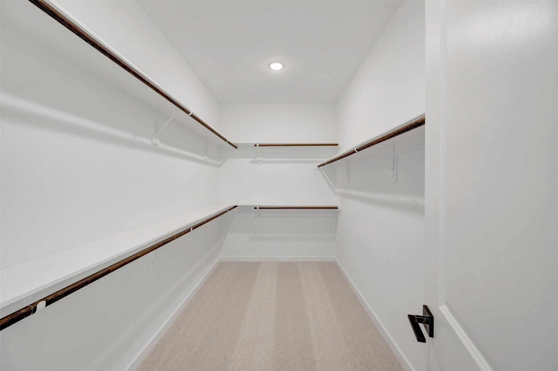 2124 River Maple Drive, Magnolia, TX 77363 Primary walk-in closet (*Photo not of actual home and used for illustration purposes only. Colors/finishes may differ from the ones currently selected in the home.)