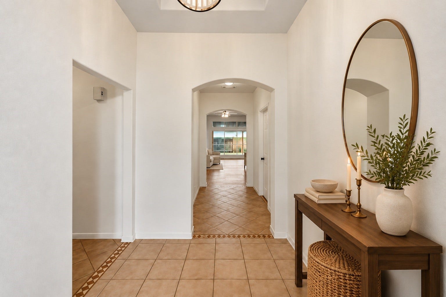 2331 Princess Deanna Lane, Katy, TX 77493 Virtually Staged: This hallway incorporates clean lines and high ceilings with classic arched pass-throughs that draw the eye toward the rear of the home.