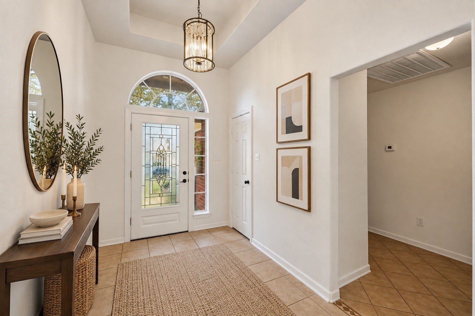 2331 Princess Deanna Lane, Katy, TX 77493 Virtually Staged: Step into a remarkably bright entryway that immediately welcomes you with soaring tray ceilings and elegant tile flooring.