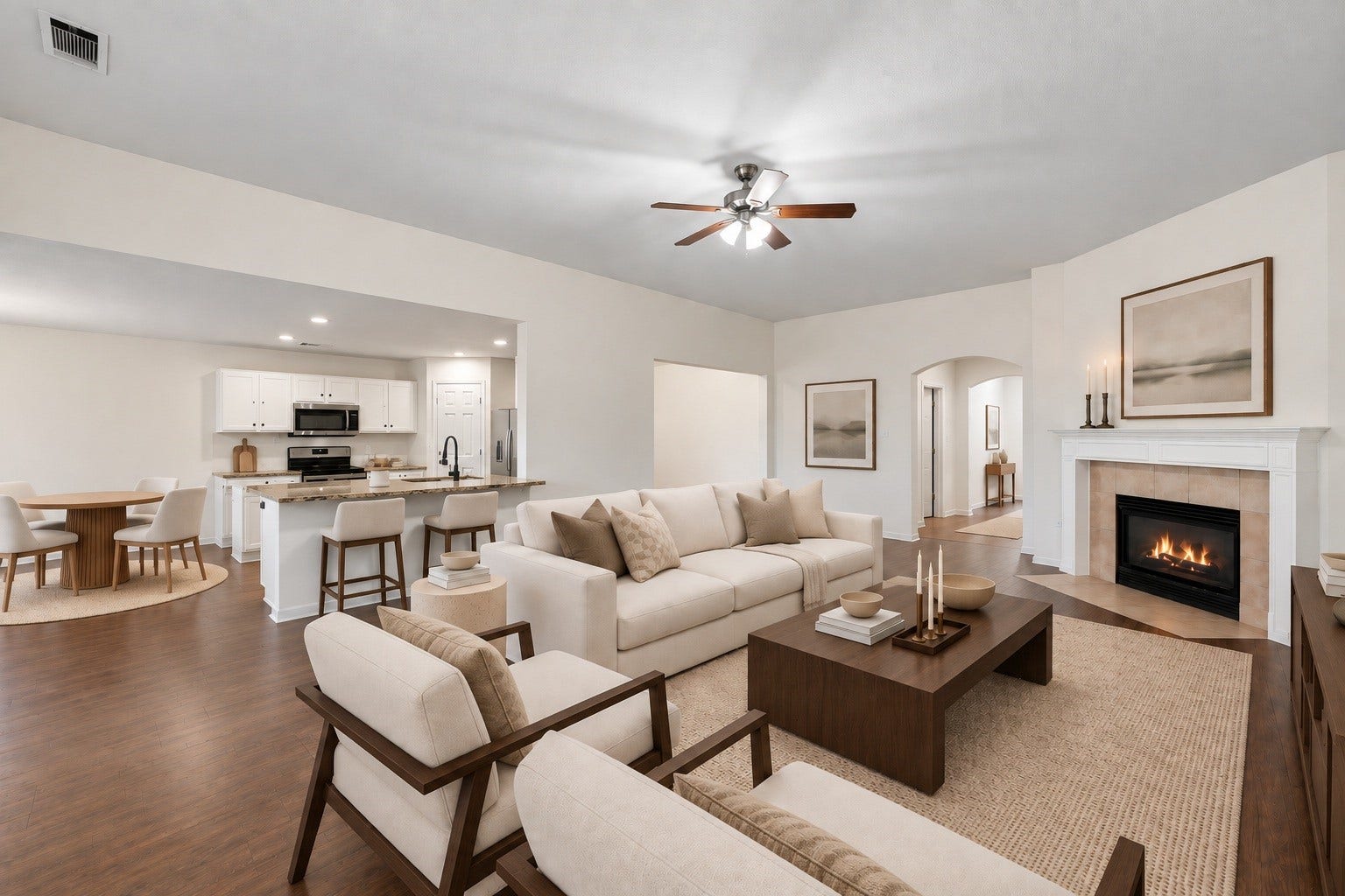 2331 Princess Deanna Lane, Katy, TX 77493 Virtually Staged: A fireplace serves as a classic focal point, complemented by tall ceilings, recessed lighting, and a extended peninsula bar for casual seating.