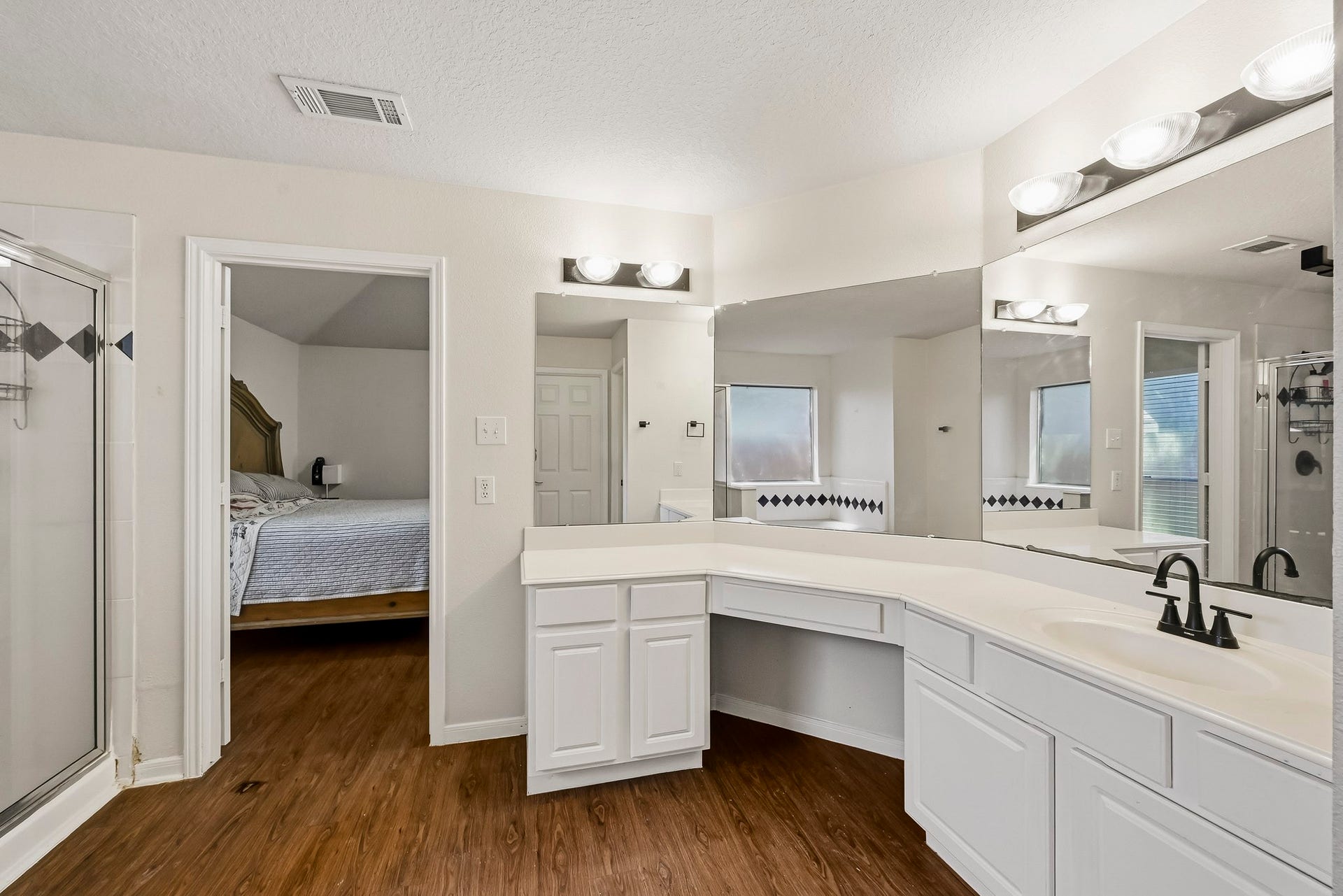 2331 Princess Deanna Lane, Katy, TX 77493 The spacious room layout effortlessly joins the separate shower enclosure and main suite into an efficient floor plan.