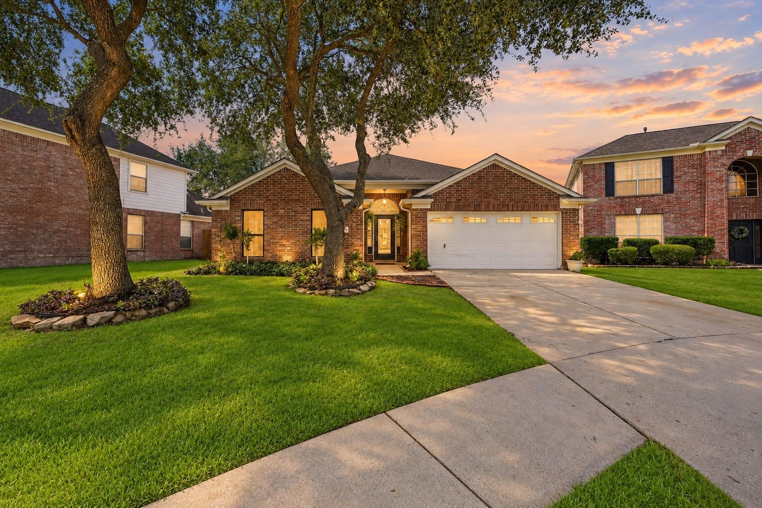 2331 Princess Deanna Lane, Katy, TX 77493 Welcome home to this charming single-story brick retreat! Nestled on a lush lot with mature trees, stone-bordered flower beds, and warm exterior lighting, it offers exceptional curb appeal and a spacious driveway with a two-car garage.