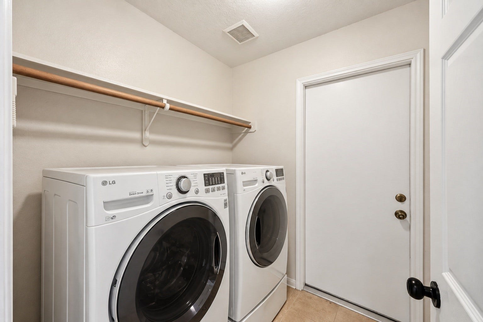 2331 Princess Deanna Lane, Katy, TX 77493 Virtually Cleaned: Designed with convenience in mind, this dedicated utility space accommodates full-size laundry appliances.