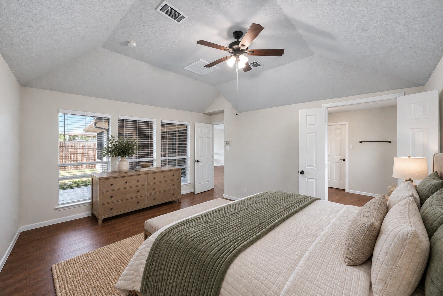 2331 Princess Deanna Lane, Katy, TX 77493 Virtually Staged: Three broad side-by-side windows provide exceptional light and garden views, completing a private and functional retreat.