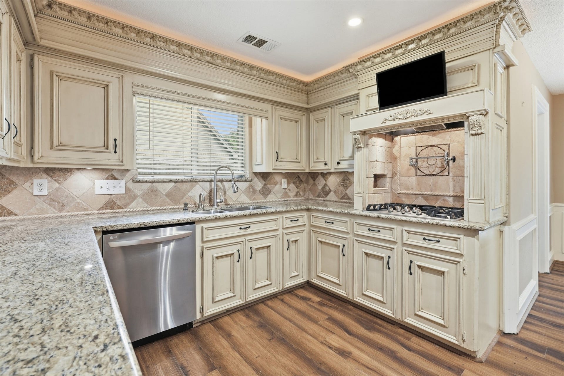 Enjoy preparing meals while remaining connected to the adjacent living and breakfast areas.