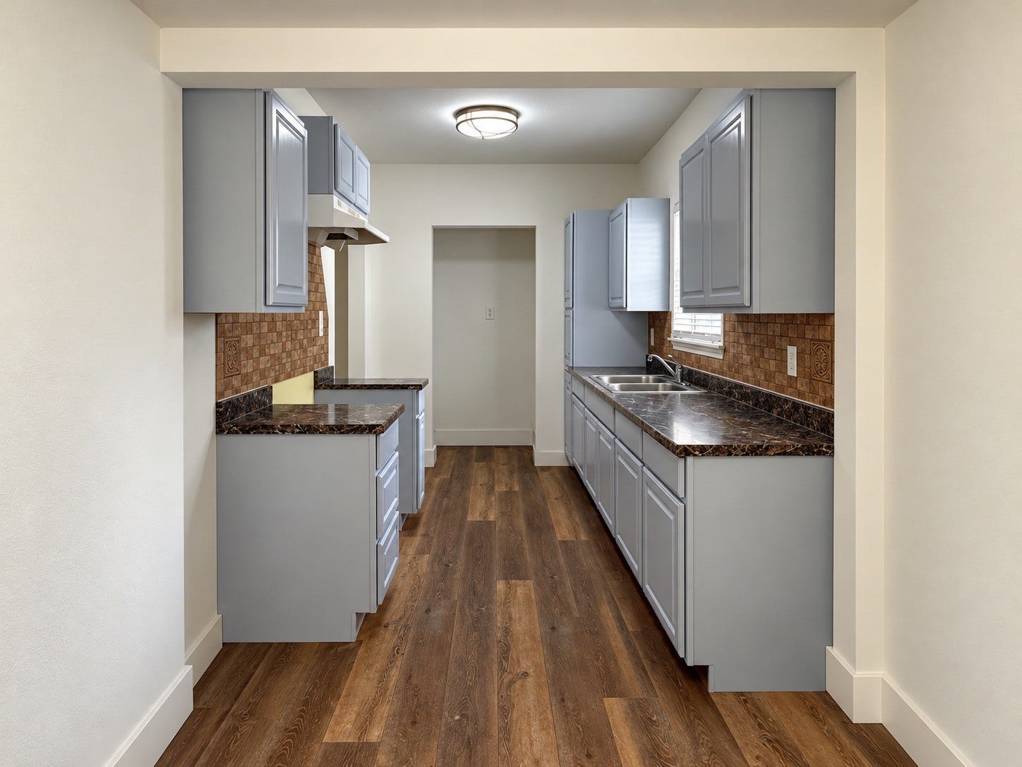 416 W Brazos Avenue, West Columbia, TX 77486 Streamlined kitchen with beautiful counters and cabinetry