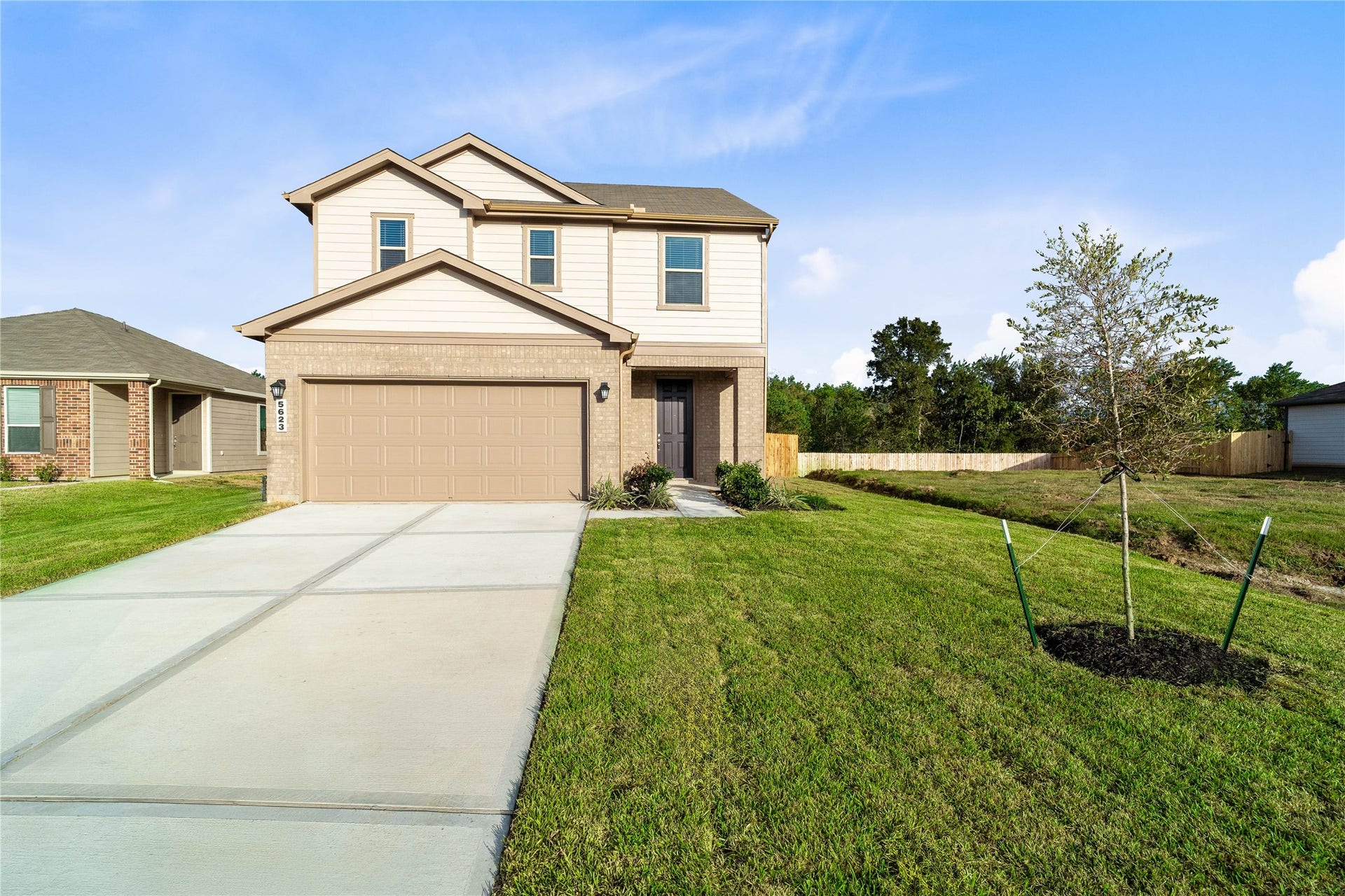 5623 Blackbird Lane, Hitchcock, TX 77563 Welcome to 5623 Blackbird Lane in Sunset Grove, featuring a fresh KB Home exterior with warm beige siding, contrasting dark green shutters, and a welcoming covered entry. Ready to see all this new construction home has to offer? Schedule your private showing today!
