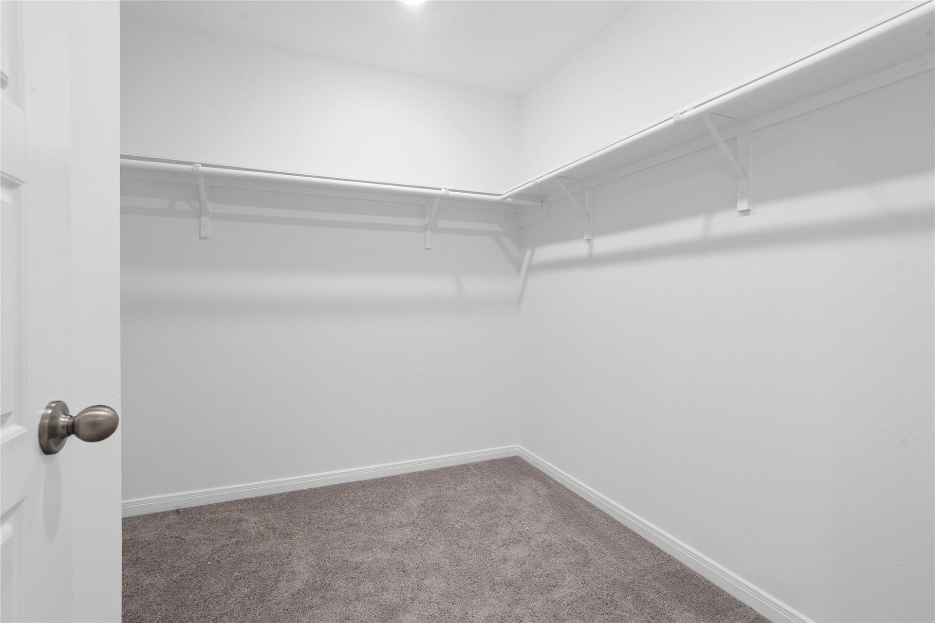 5623 Blackbird Lane, Hitchcock, TX 77563 The primary walk in closet provides convenient storage for clothing, shoes, and everyday essentials, helping keep your personal space organized.