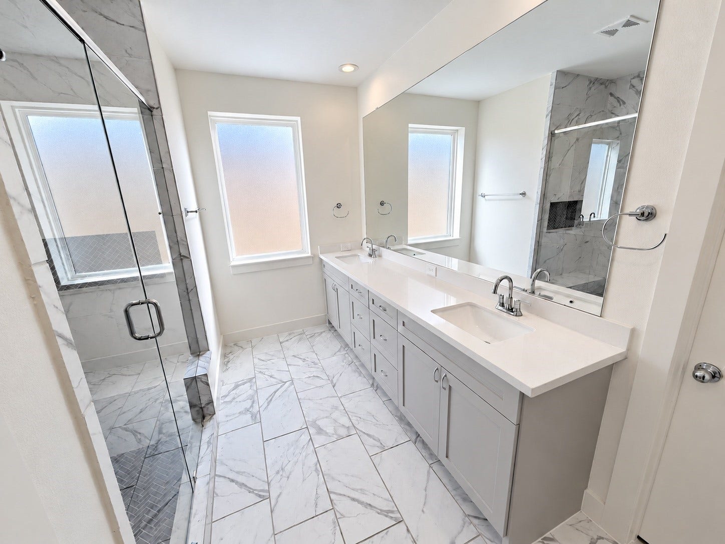 2906 Cline Street, Houston, TX 77020 Elegant third-floor bathroom with dual sinks, a spacious vanity, and a glass-enclosed shower.