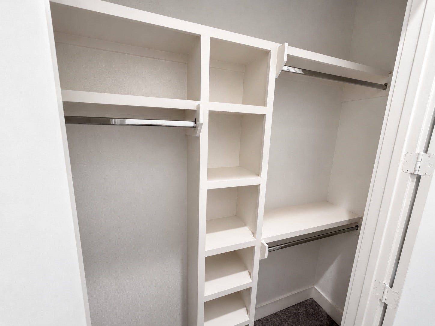 2906 Cline Street, Houston, TX 77020 Downstairs bedroom closet with built-in shelving and ample hanging space.