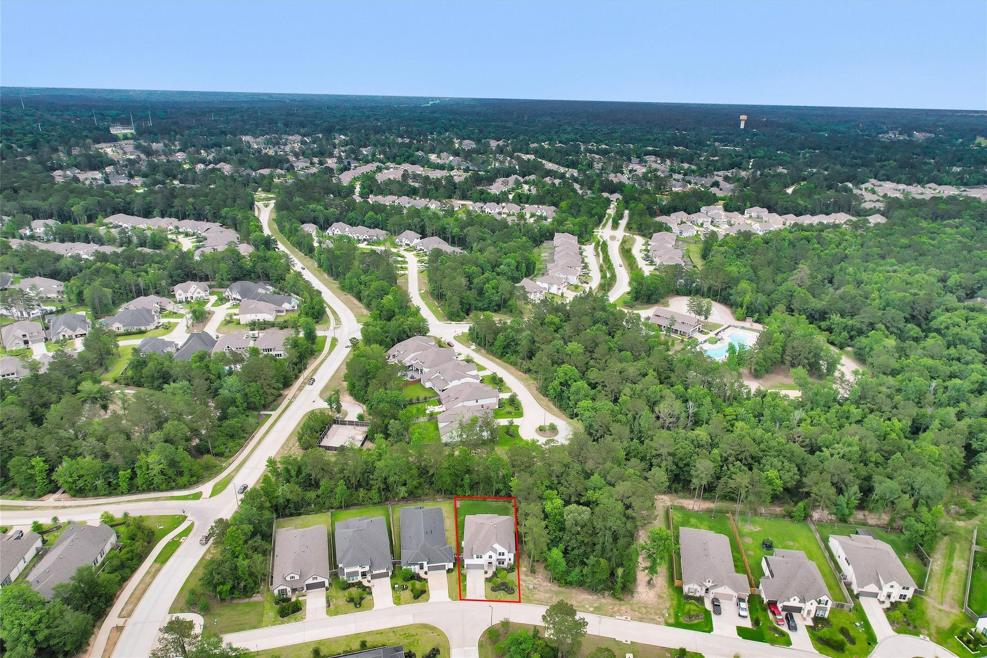 Enjoy unmatched privacy on this premier lot, where a wooded reserve borders both the side and rear of the property, allowing tranquil views through the wrought-iron fence.
