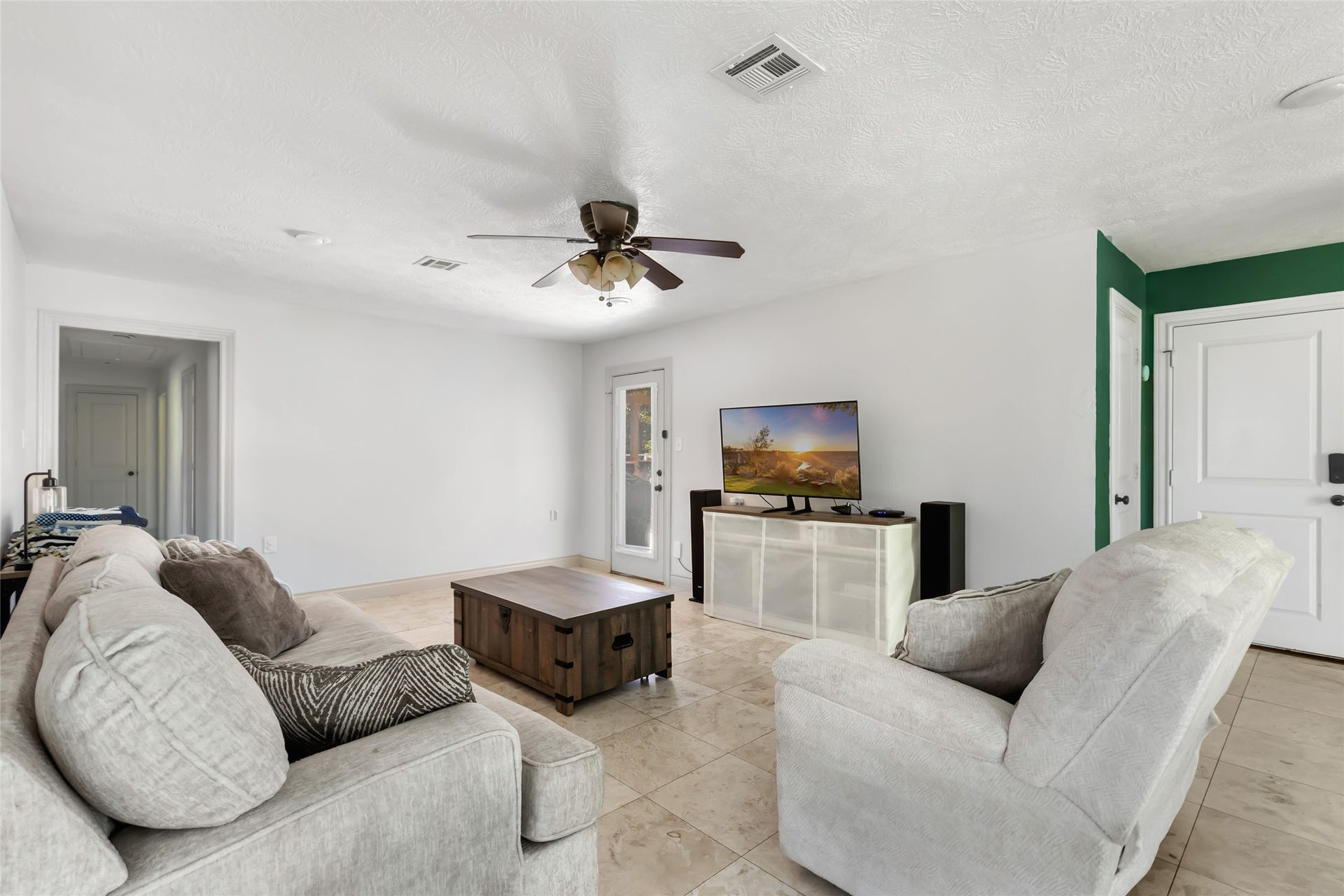 2543 Fountain View Street, New Caney, TX 77357 Living Room with Access to Backyard