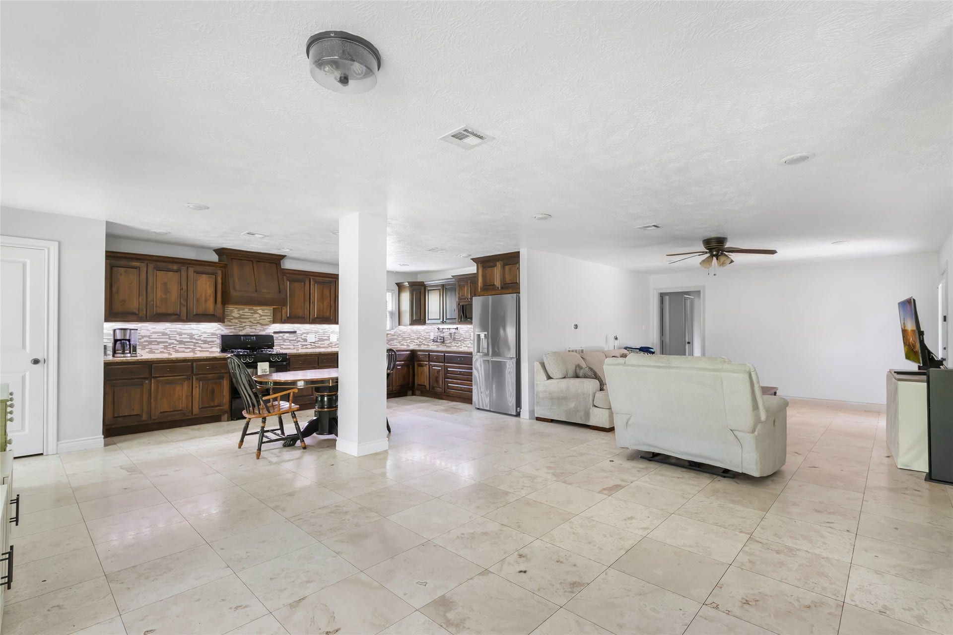 2543 Fountain View Street, New Caney, TX 77357 Open Concept Living, Kitchen, and Dining Area