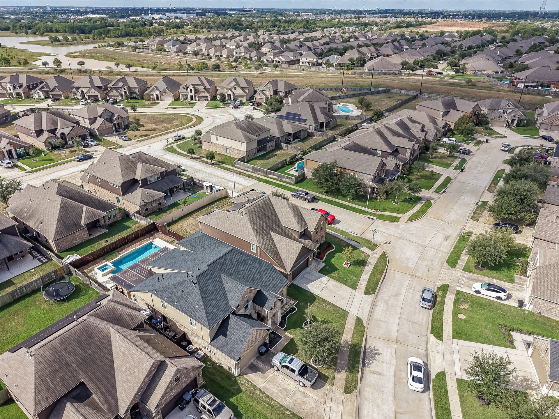 2826 Verdant Spring Trail, Katy, TX 77493 Nestled in a charming suburban neighborhood, this expansive home features a beautifully maintained backyard with ample space for a future poolan ideal setting for relaxation and refined outdoor living.