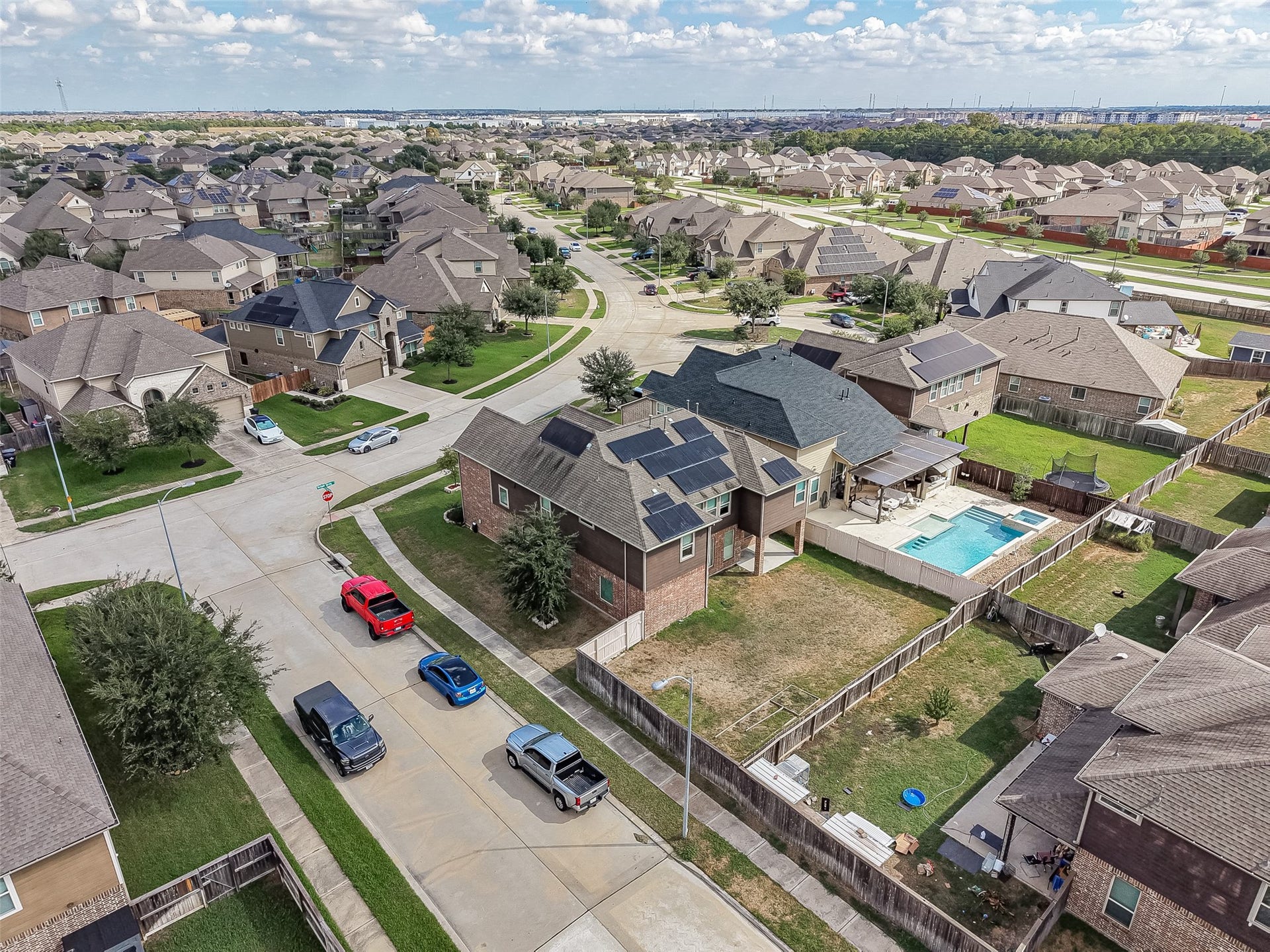 2826 Verdant Spring Trail, Katy, TX 77493 Charming suburban neighborhood featuring spacious homes with well-maintained yards and private pools, ideal for family living.