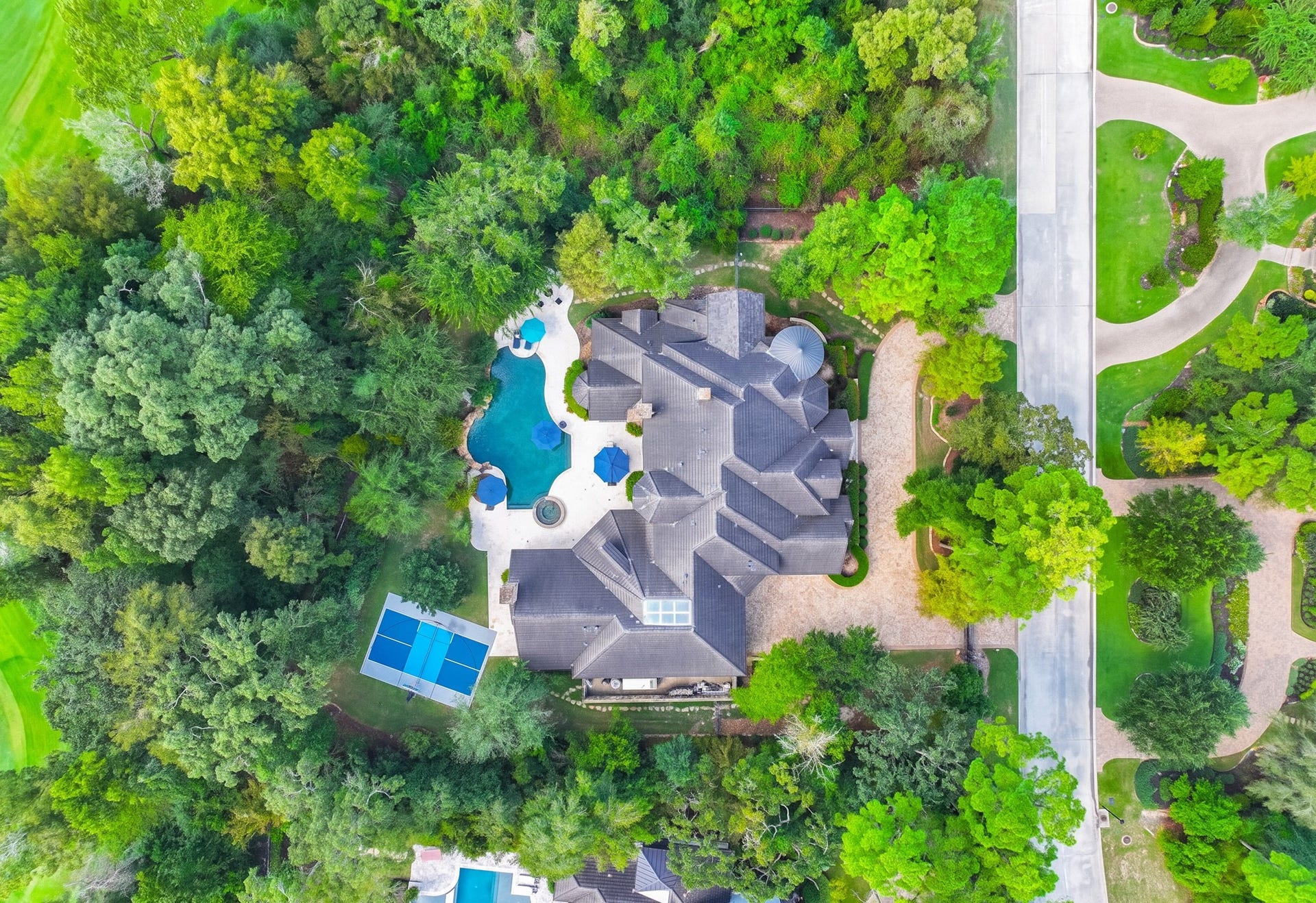 247 S Fazio Way, Spring, TX 77389 247 S. Fazio Way offers a true resort-style living experience with a sparkling pool, sports court, expansive outdoor living spaces, and unmatched privacy in the heart of Carlton Woods.