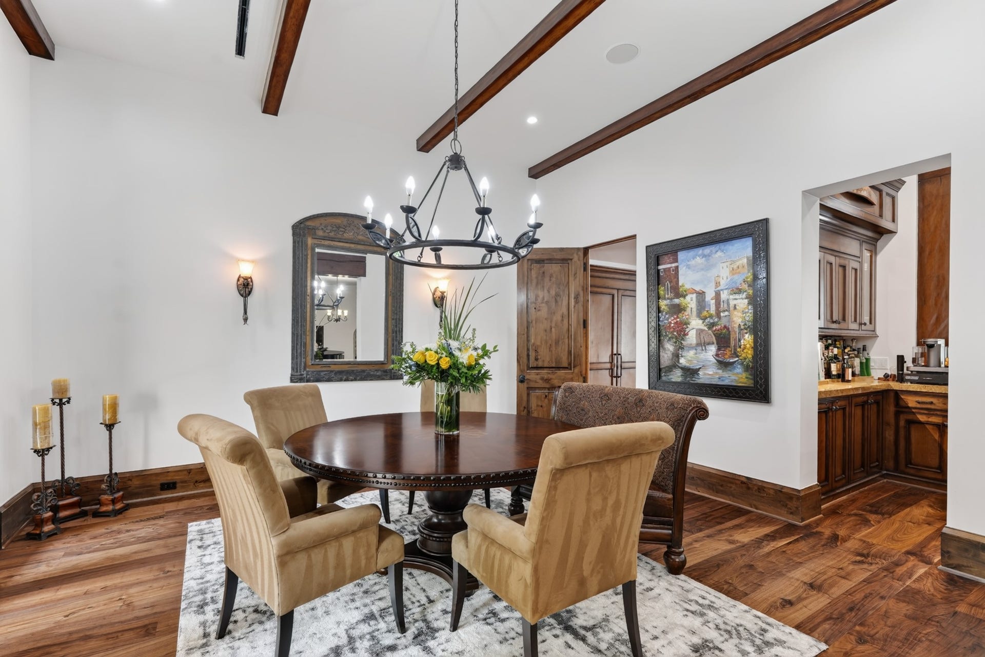 247 S Fazio Way, Spring, TX 77389 Elegant and inviting formal dining room, highlighted by vaulted ceilings, warm wood flooring and timeless architectural details, create the perfect setting for special gatherings.