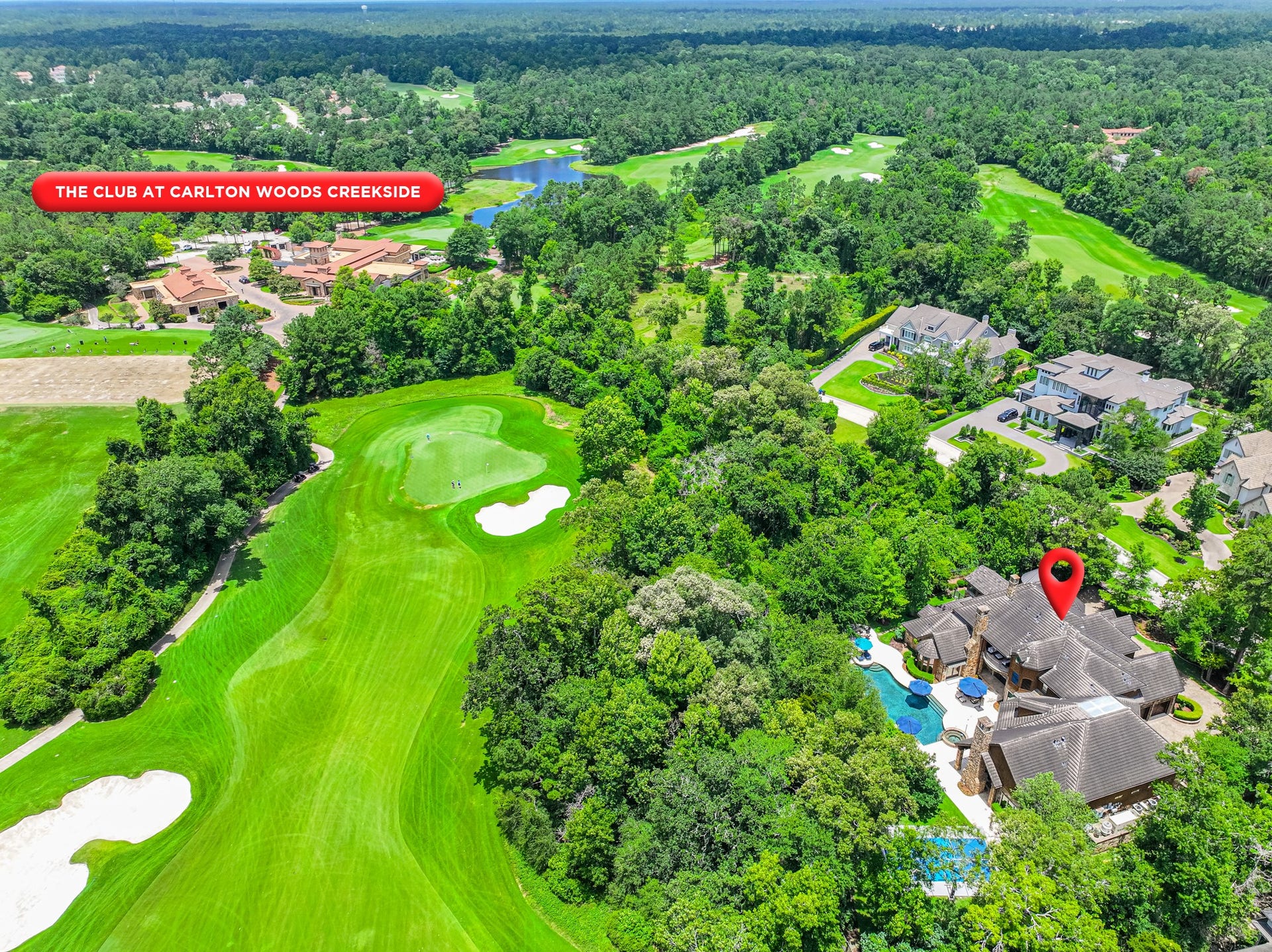 247 S Fazio Way, Spring, TX 77389 Discover an unparalleled blend of privacy and luxury in this unique estate overlooking the 4th hole of the prestigious Carlton Woods Fazio Golf Course, all just a short walk to the Clubhouse.