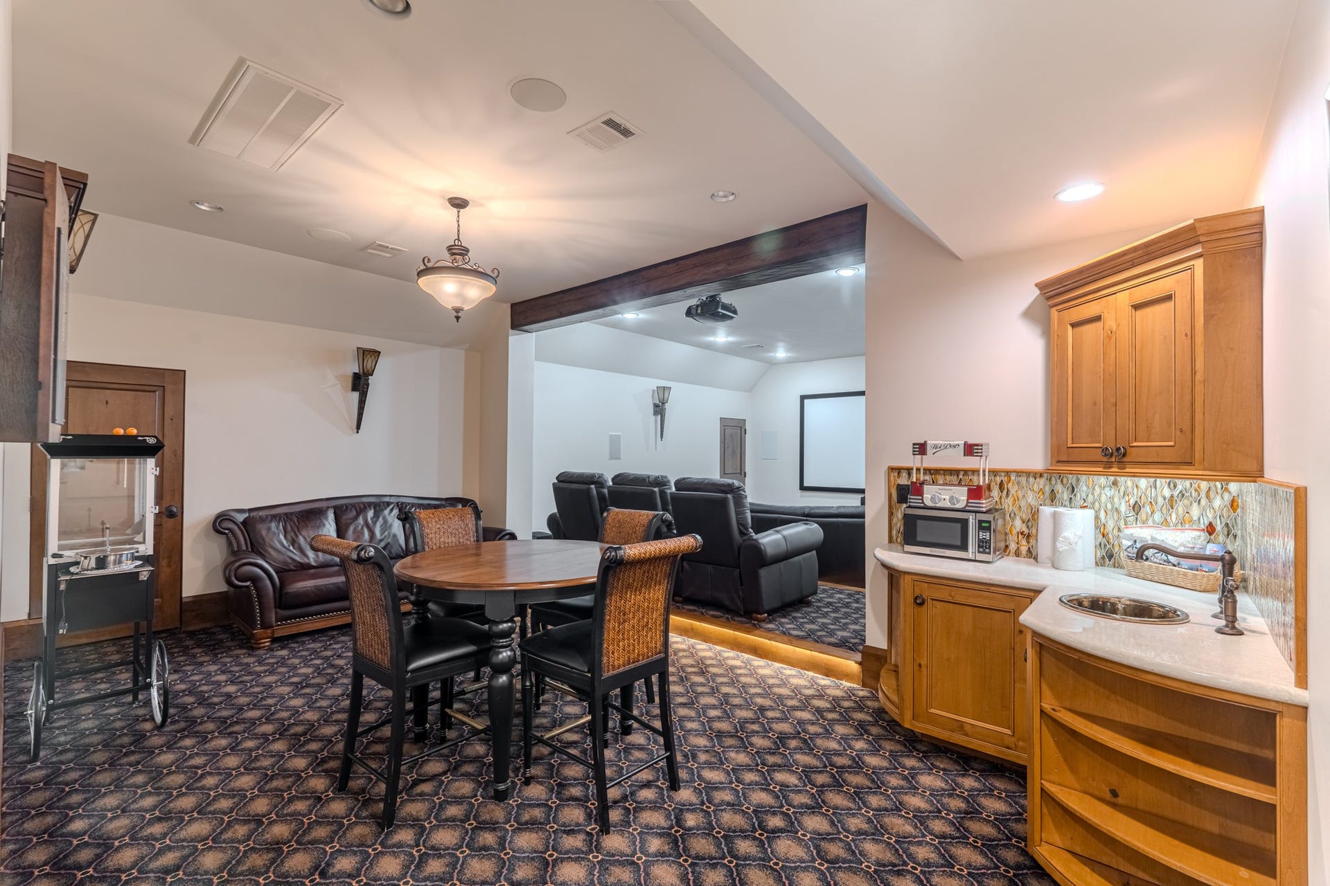 247 S Fazio Way, Spring, TX 77389 Game room with access to home theatre features a custom wet bar, designed for effortless entertaining family and friends.